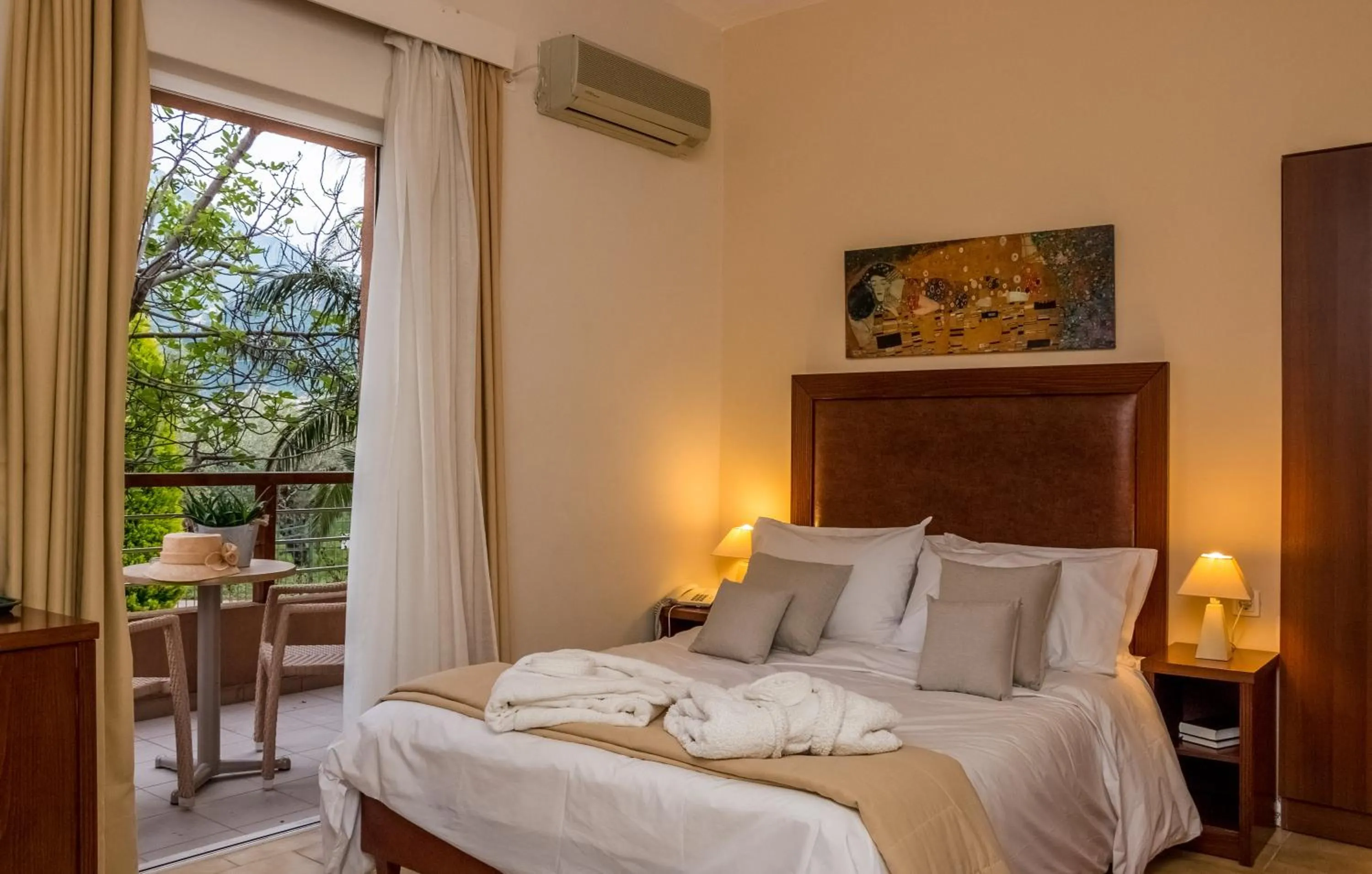 Bed in Apollo Resort Art Hotel