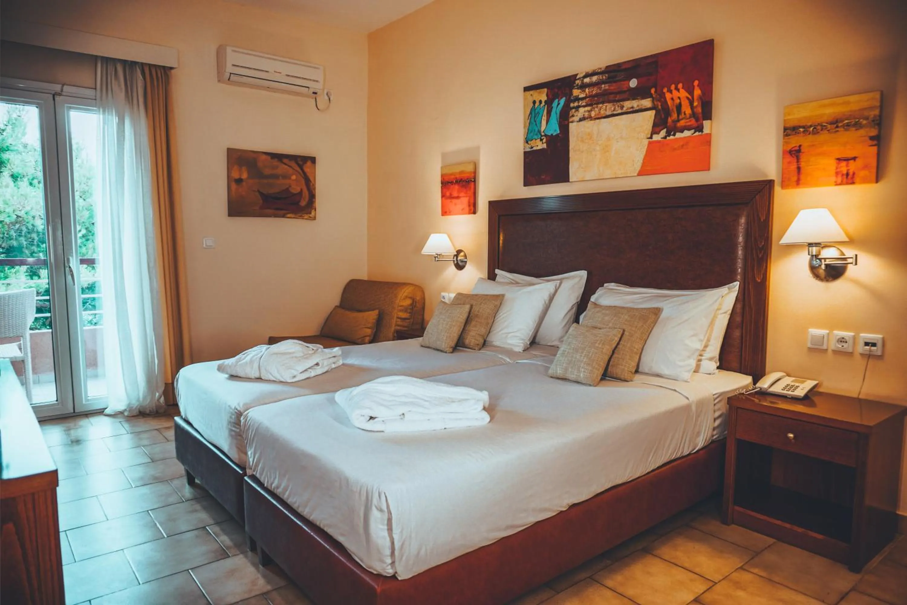 Bed in Apollo Resort Art Hotel