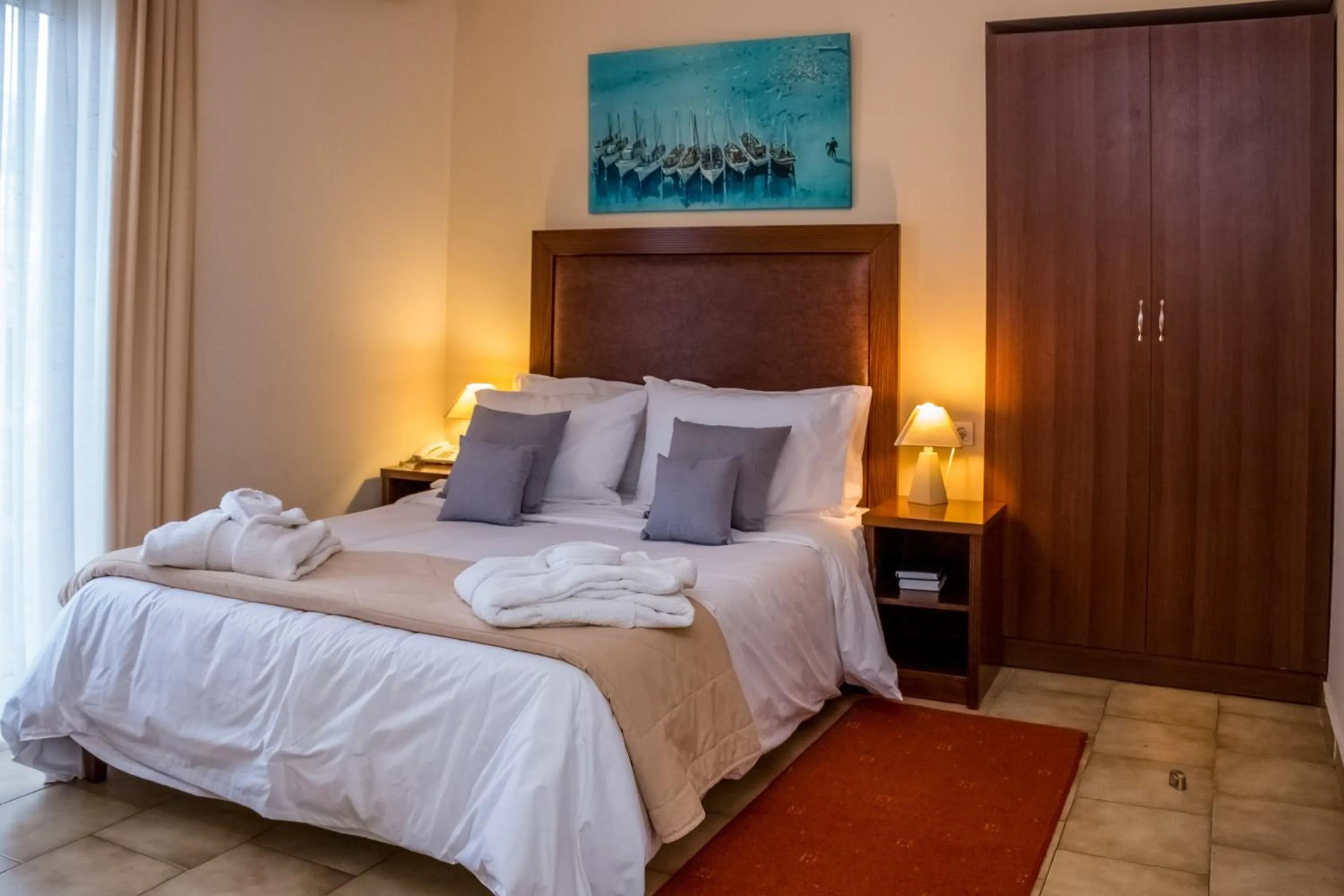 Bed in Apollo Resort Art Hotel