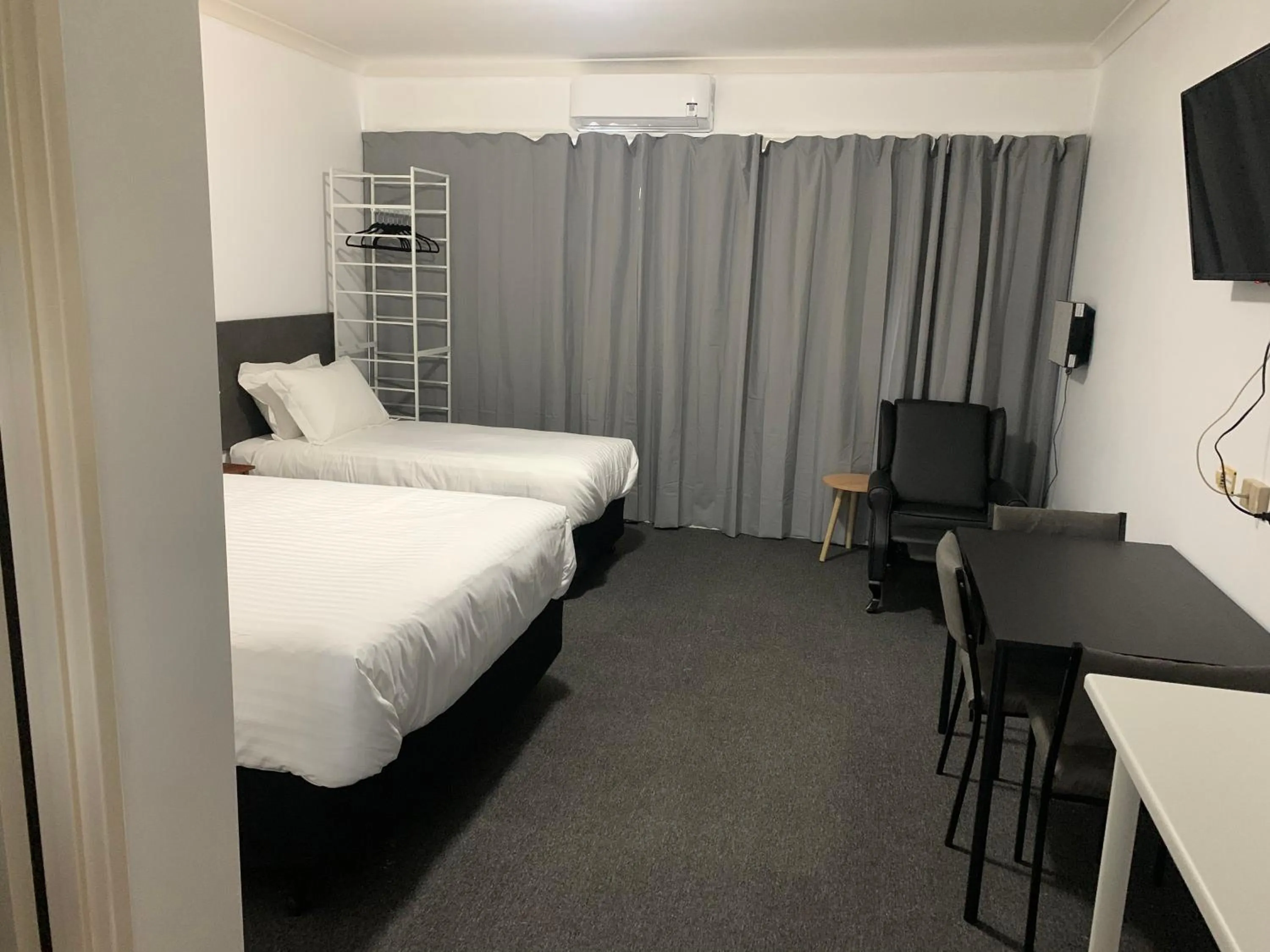 Communal lounge/ TV room, Bed in The Reserve Hotel