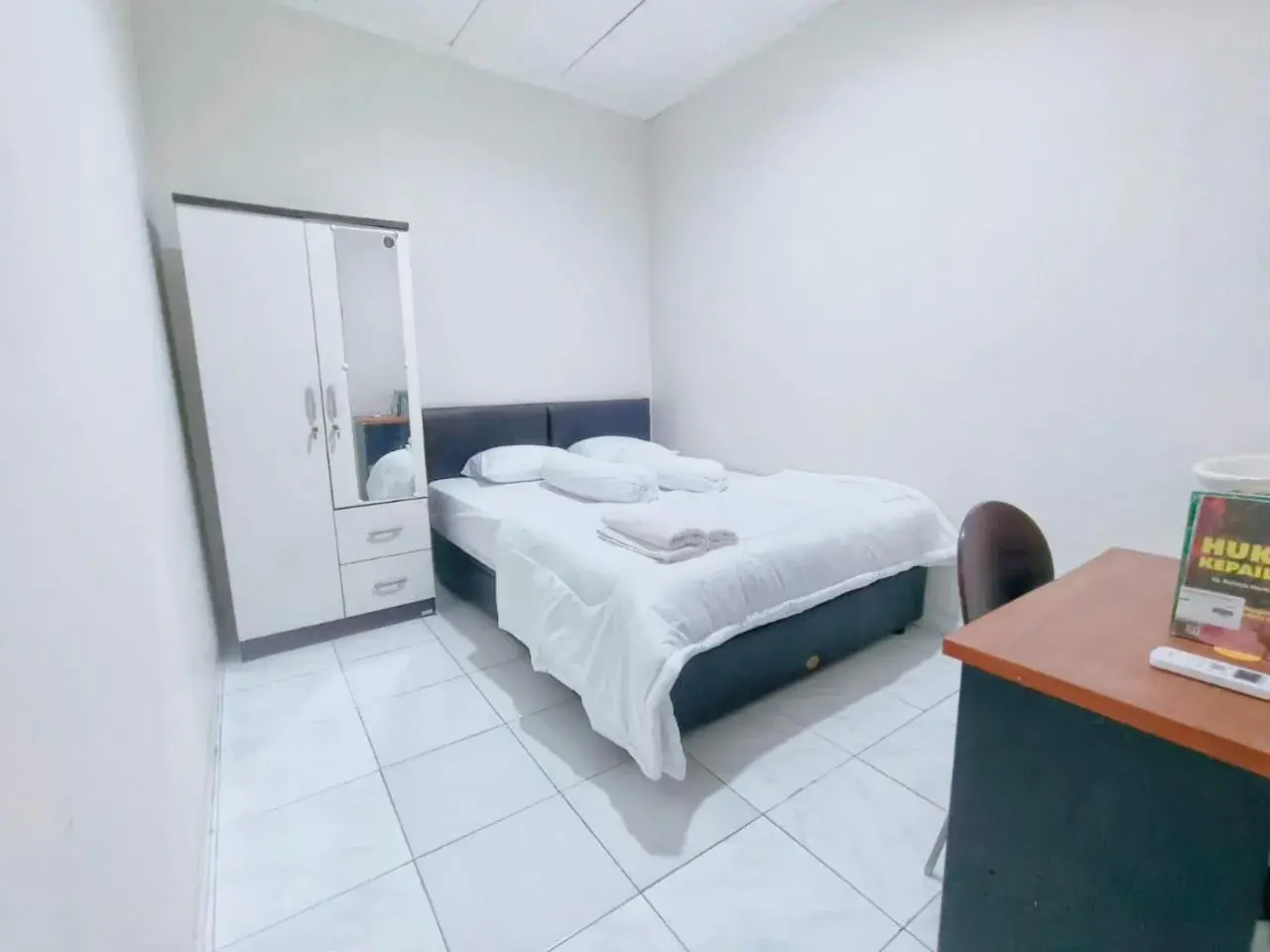 Bed in Kost Griya Asri by ecommerceloka Bed in Kost Griya Asri by ecommerceloka