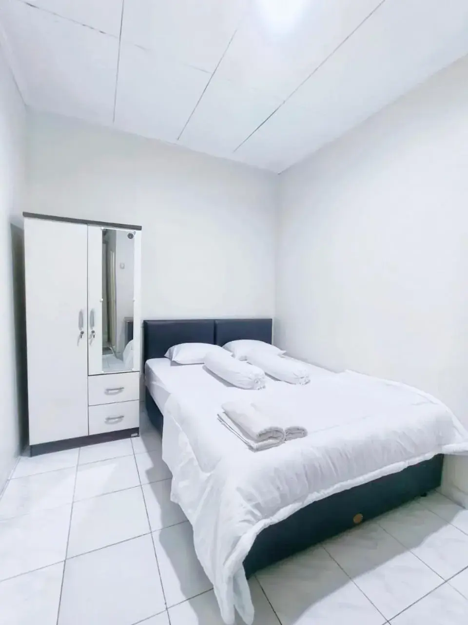 Bed in Kost Griya Asri by ecommerceloka Bed in Kost Griya Asri by ecommerceloka