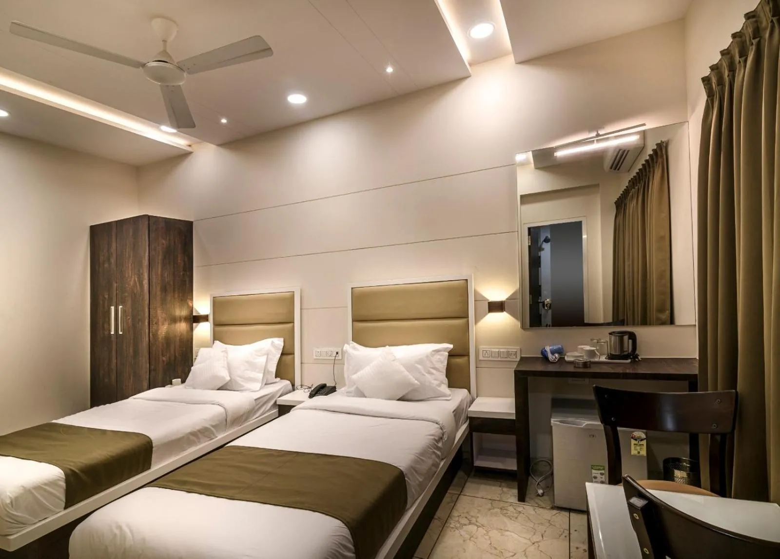 Bed in Hotel Royal Treat Surat