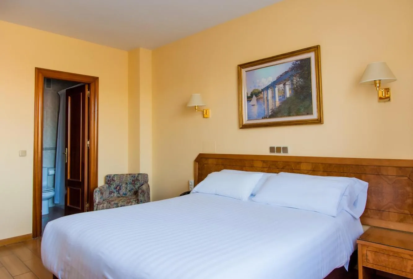 Bed in Hotel Don Carmelo