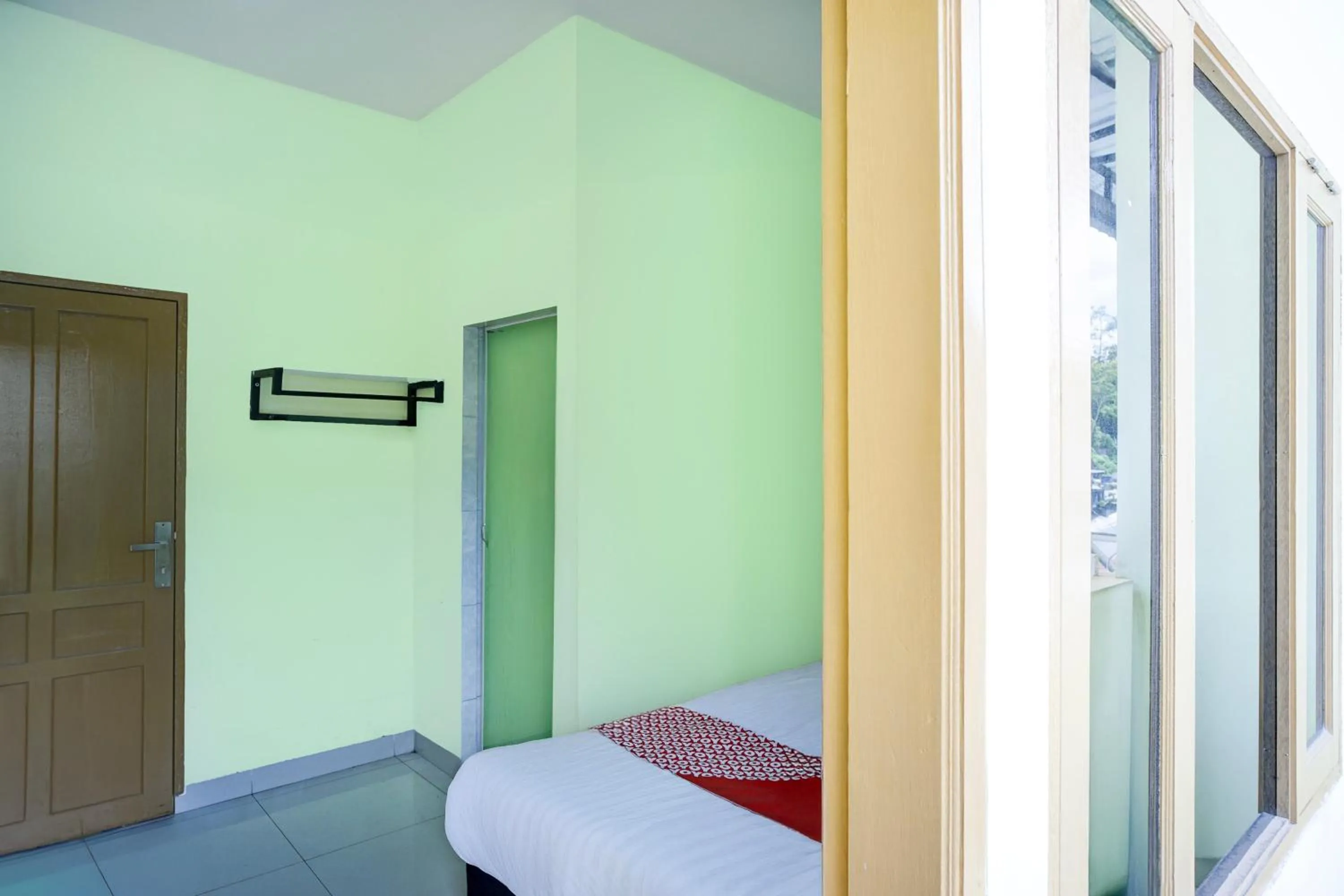 Bedroom, Bed in Hotel O Parapat Near Dermaga Ajibata Formerly Pudan Residence 2