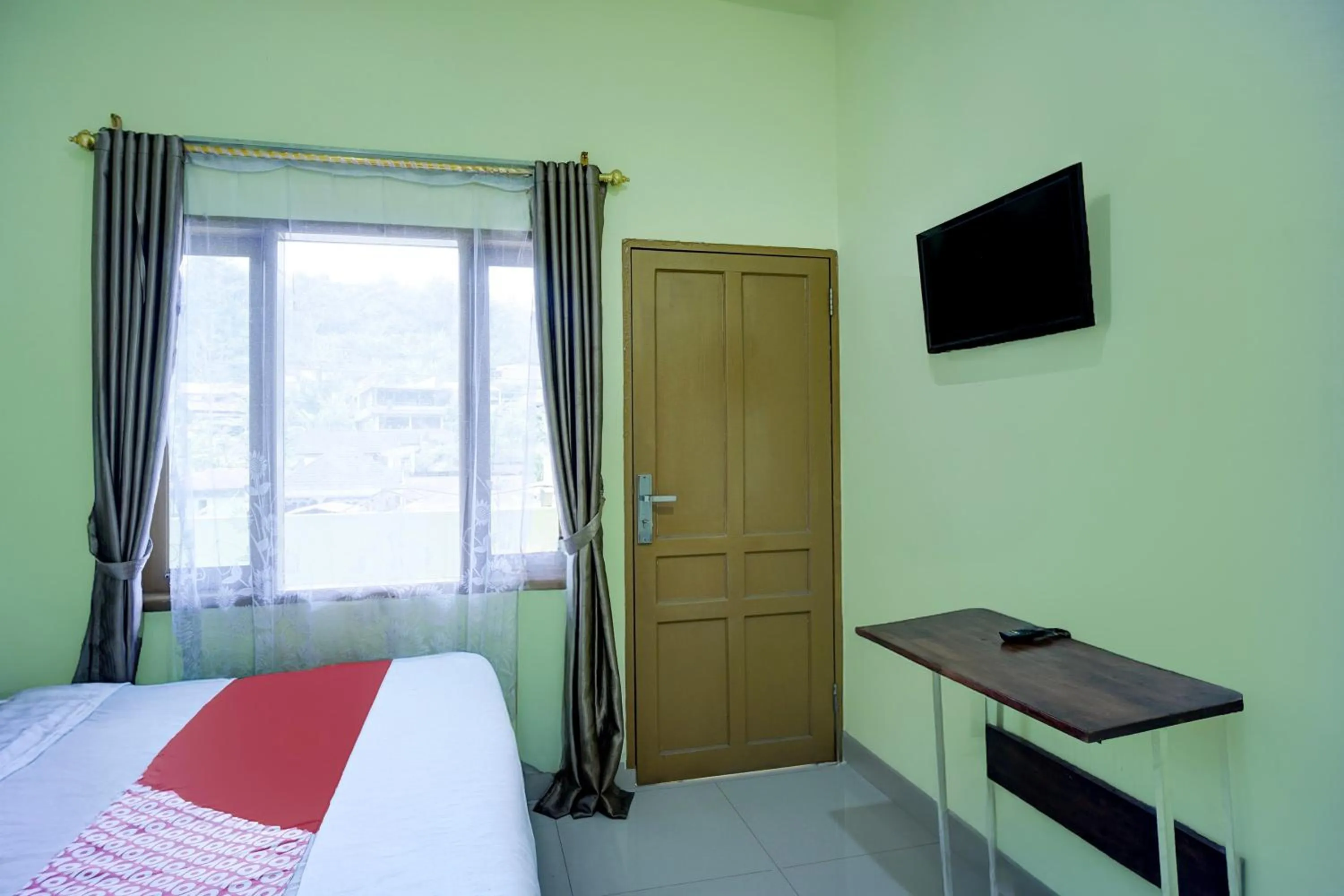 Bedroom, Bed in Hotel O Parapat Near Dermaga Ajibata Formerly Pudan Residence 2