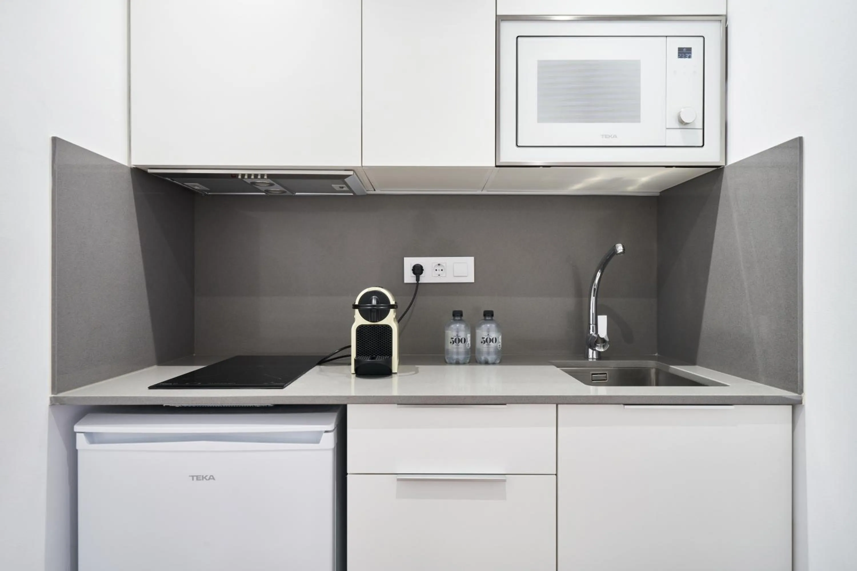 Kitchen or kitchenette in Aparthotel Augusta