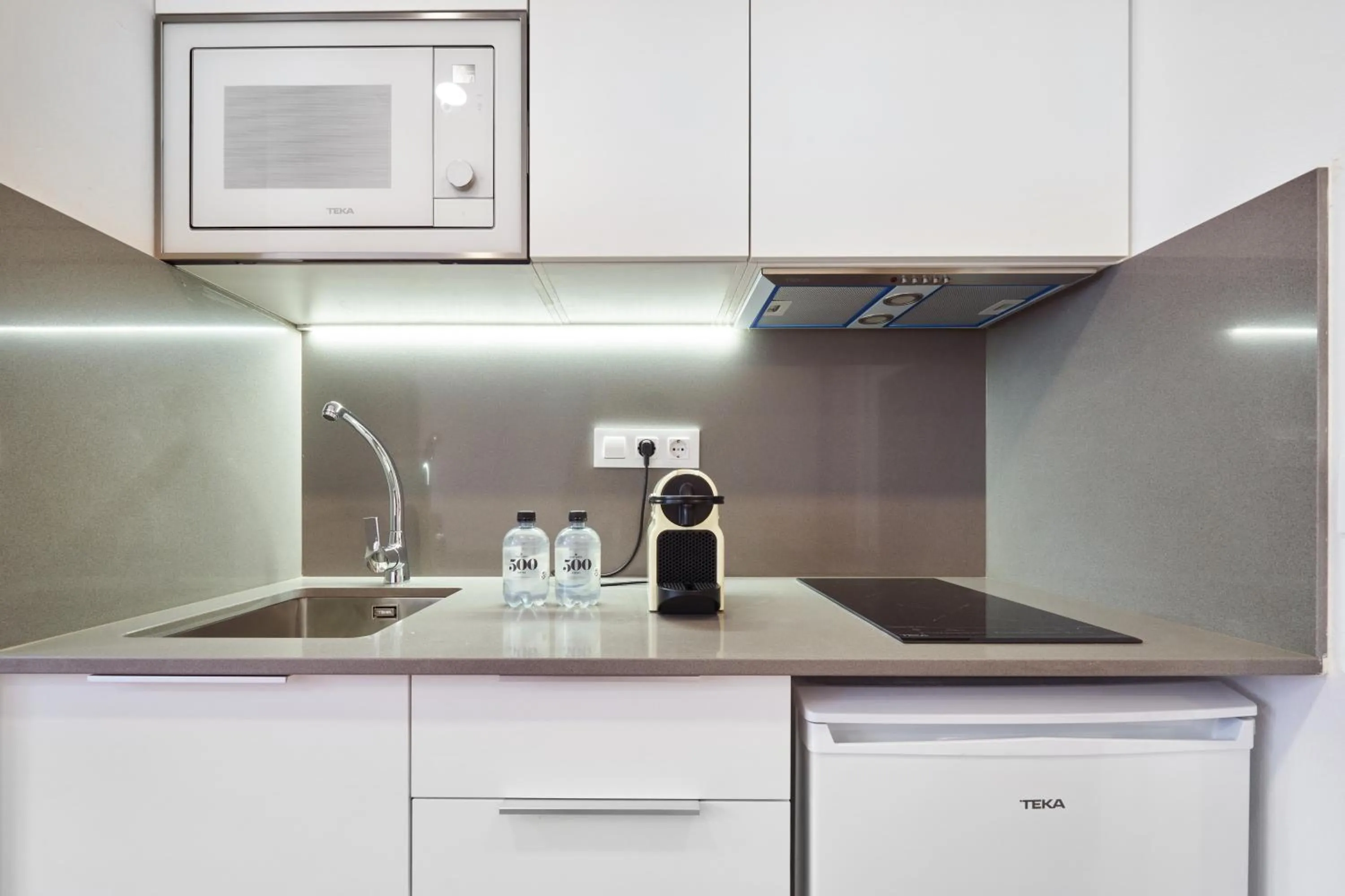 Kitchen or kitchenette in Aparthotel Augusta