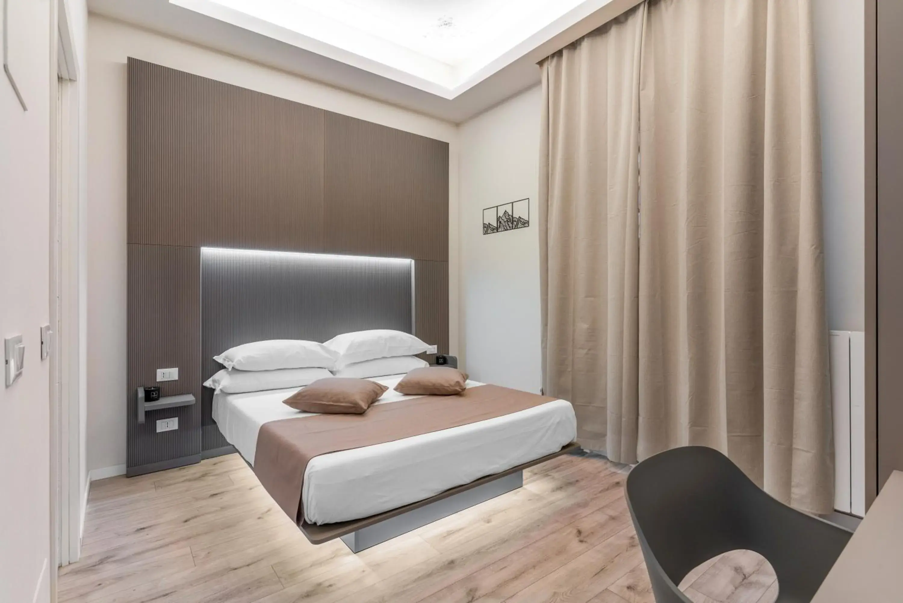 Bed in Meneghina Suites Foresteria Lombarda Bed in Meneghina Suites Foresteria Lombarda