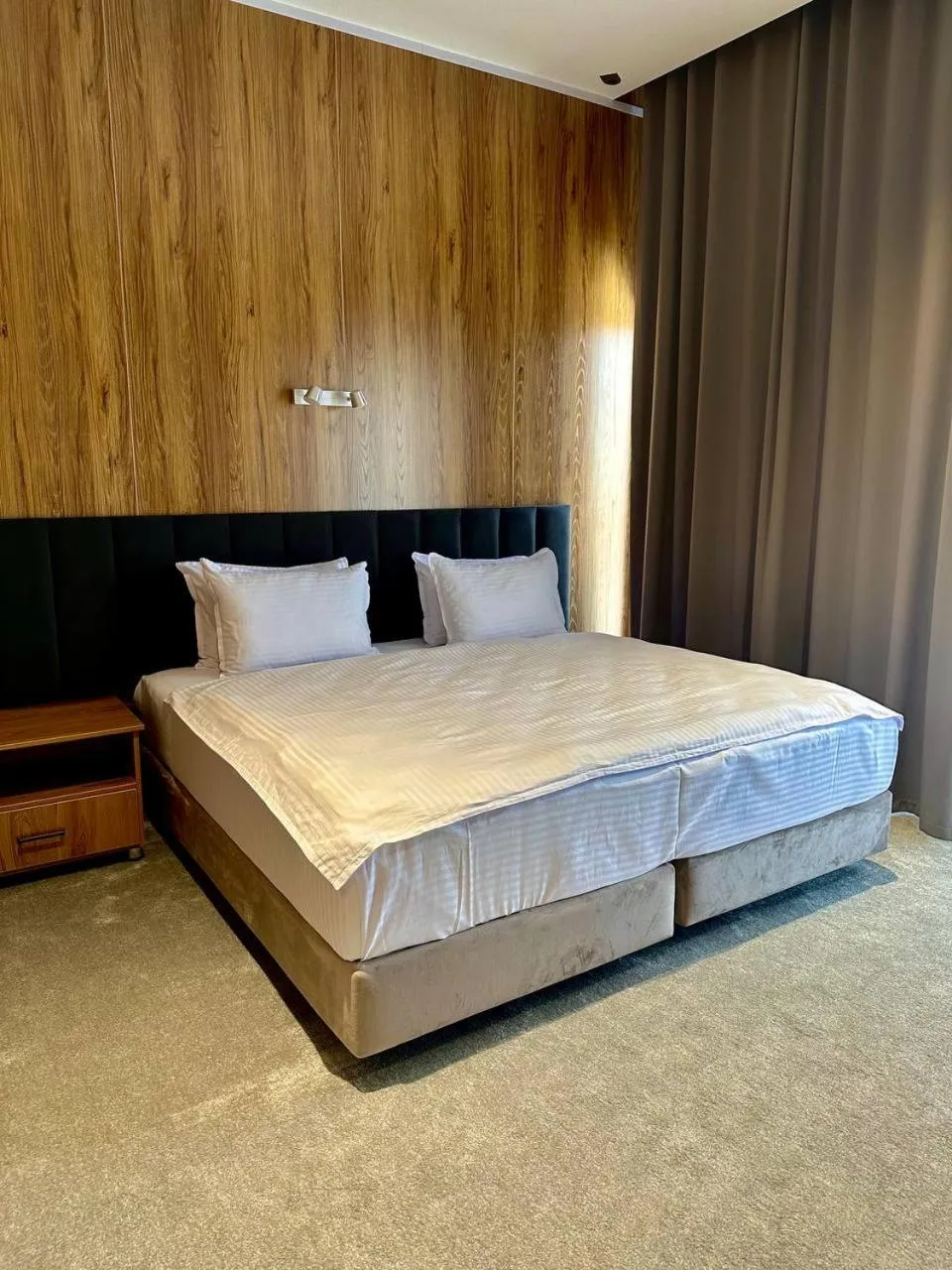 Bed in WELLFORT HOTEL