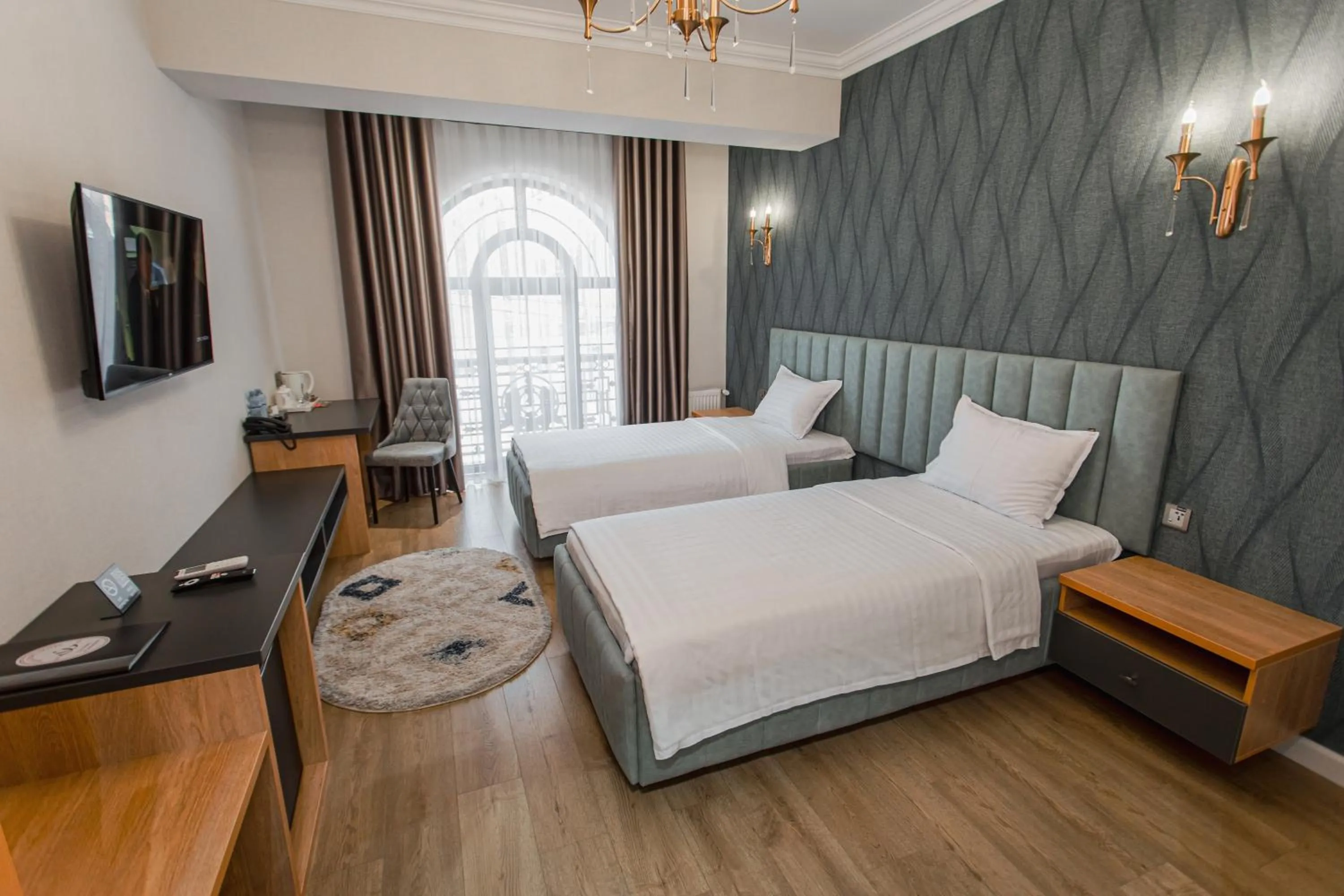 Bed in WELLFORT HOTEL