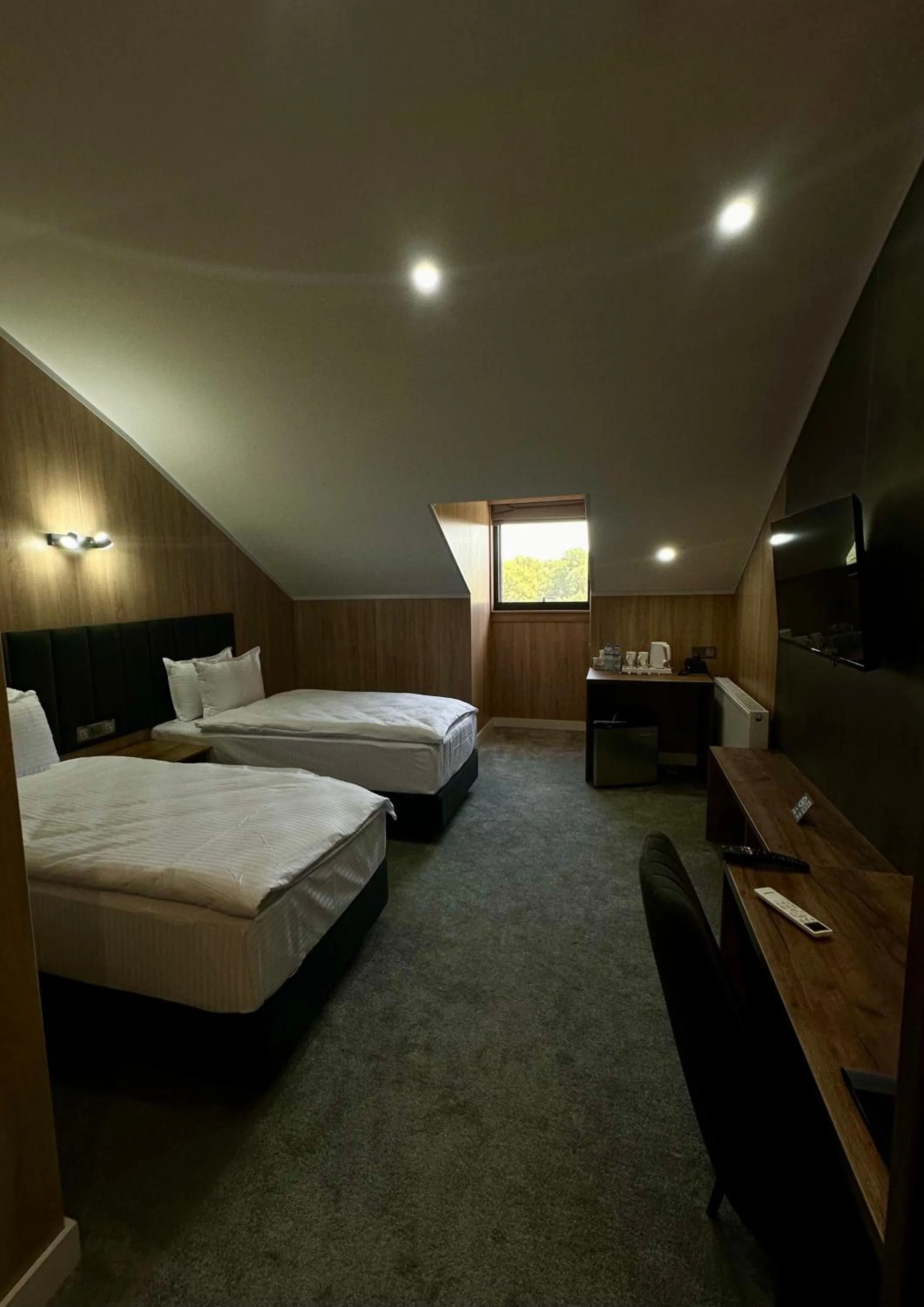 Bed in WELLFORT HOTEL