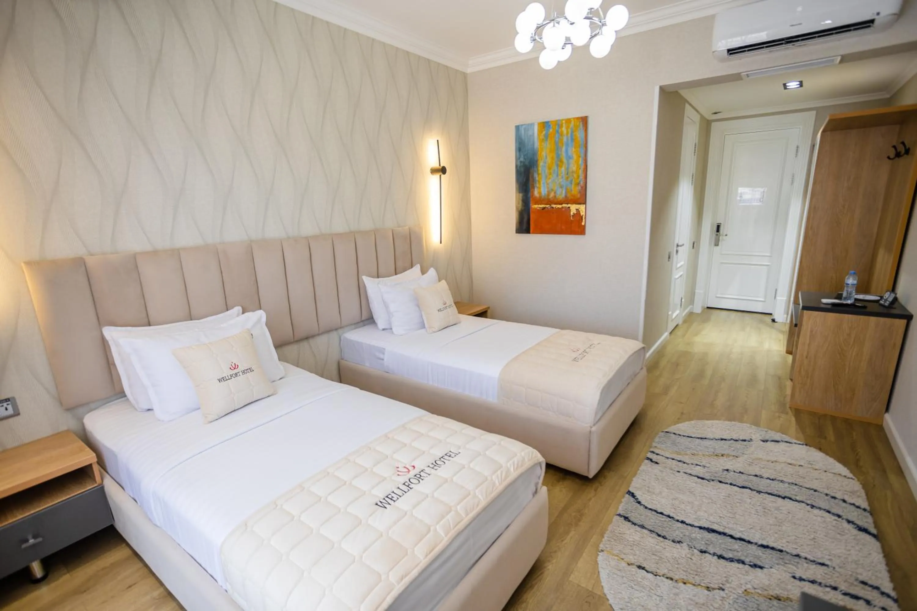 Bed in WELLFORT HOTEL