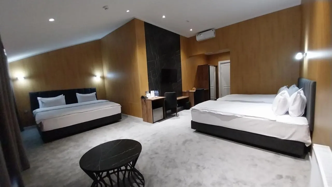 Bed in WELLFORT HOTEL