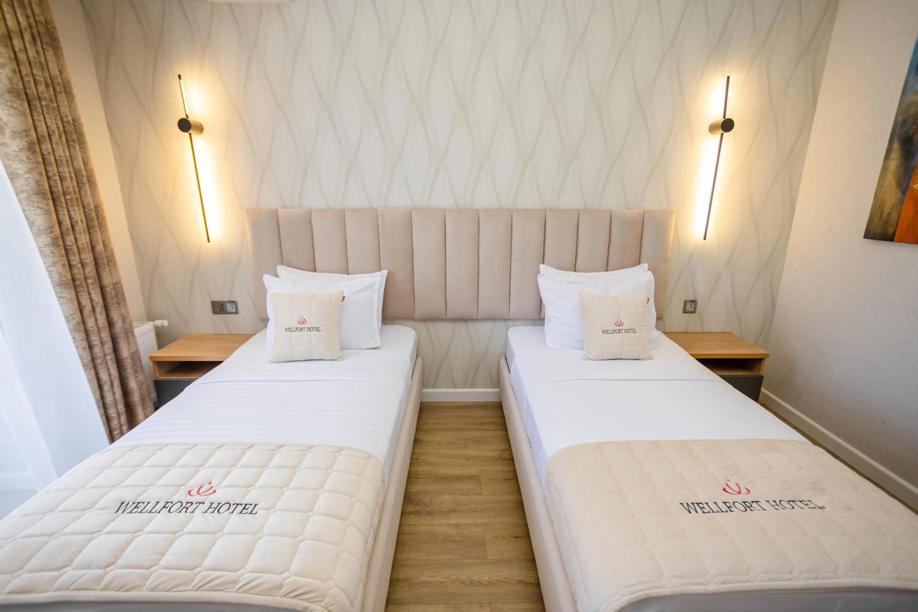 Bed in WELLFORT HOTEL