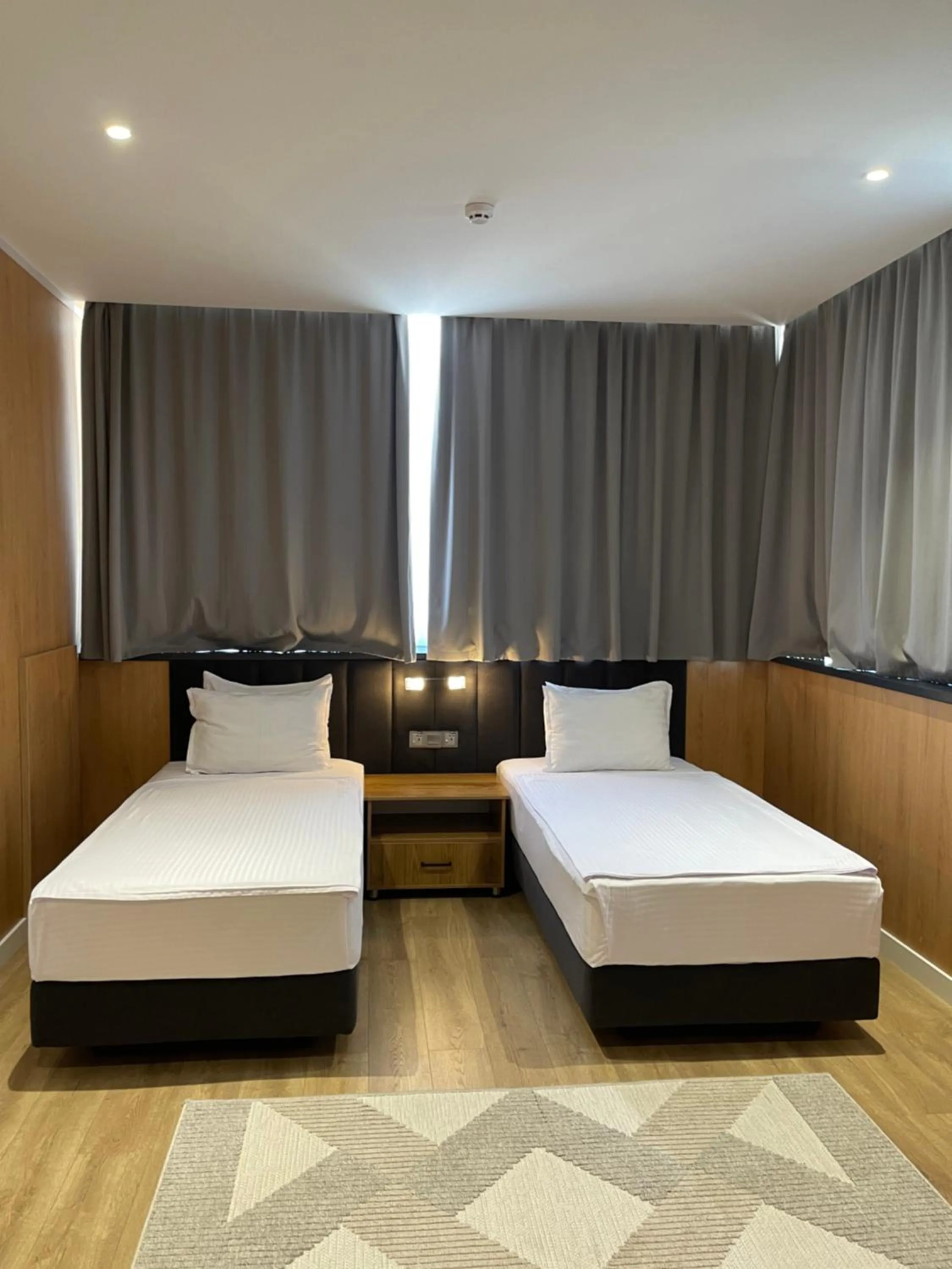 Bed in WELLFORT HOTEL