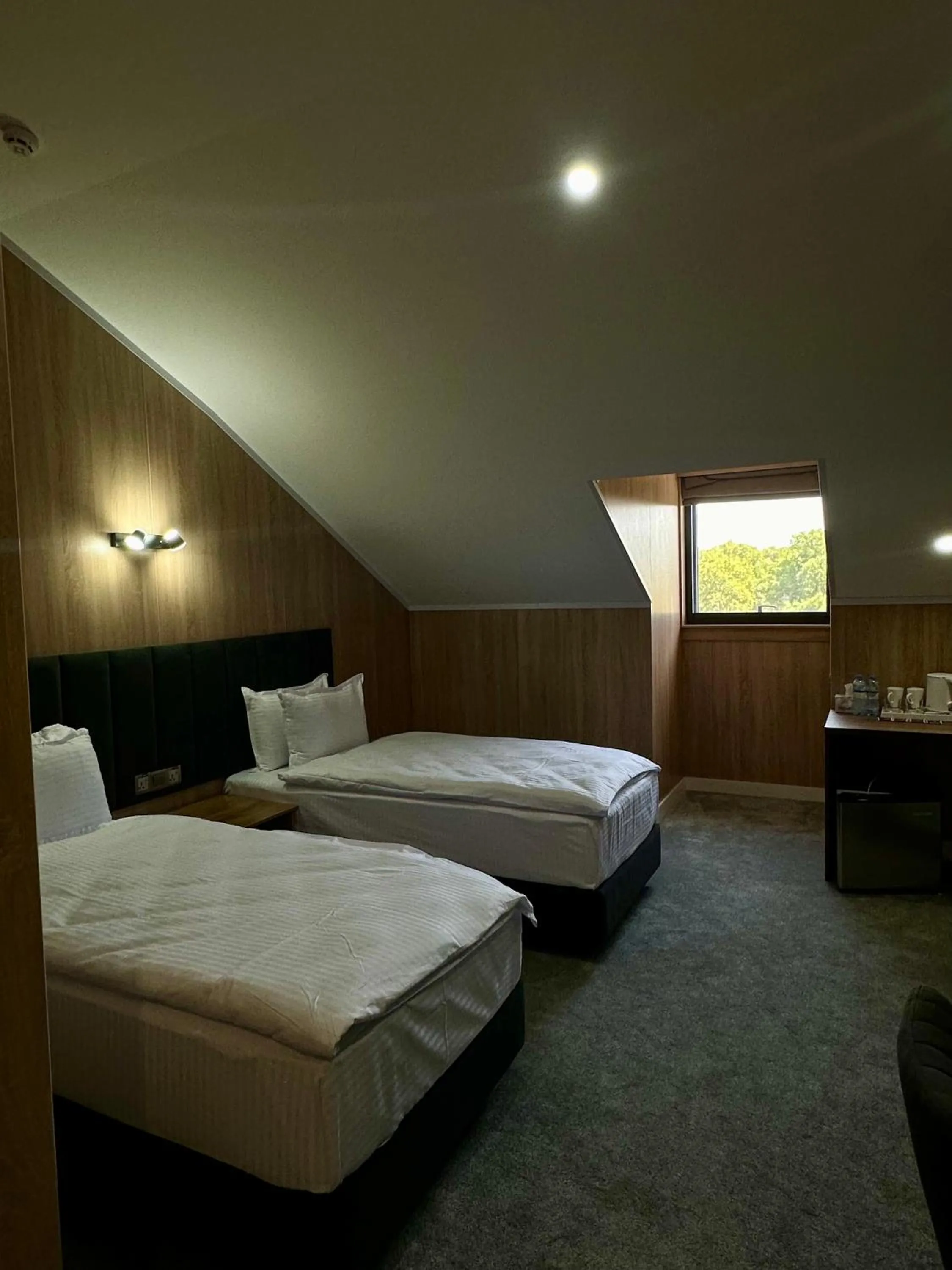 Bed in WELLFORT HOTEL