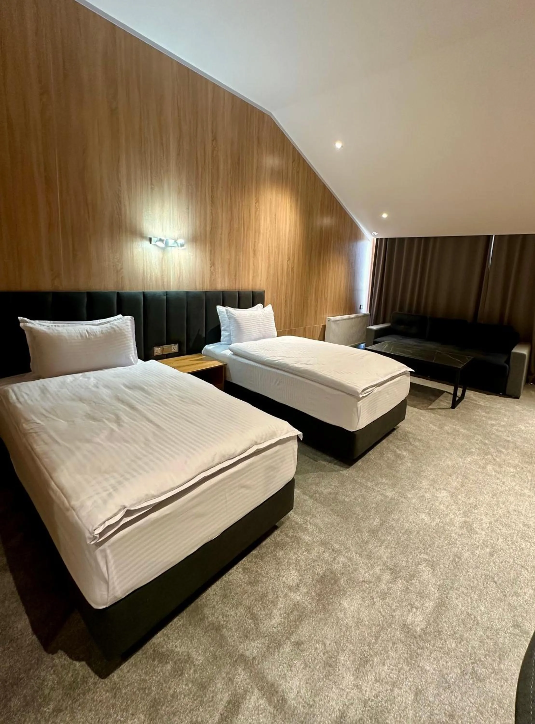 Bed in WELLFORT HOTEL