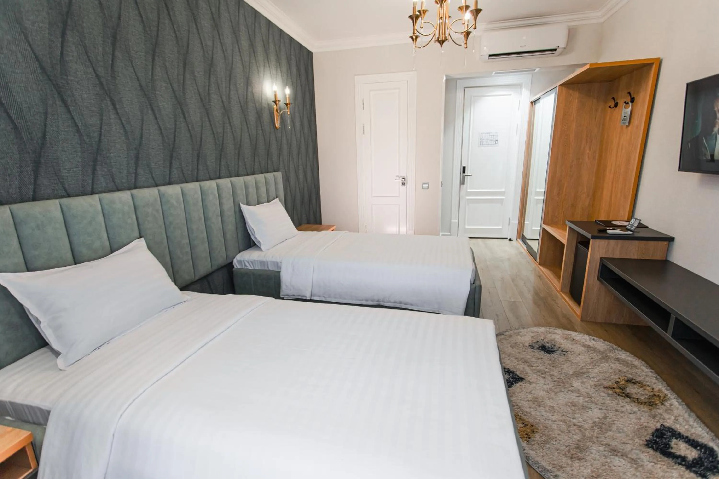 Bed in WELLFORT HOTEL