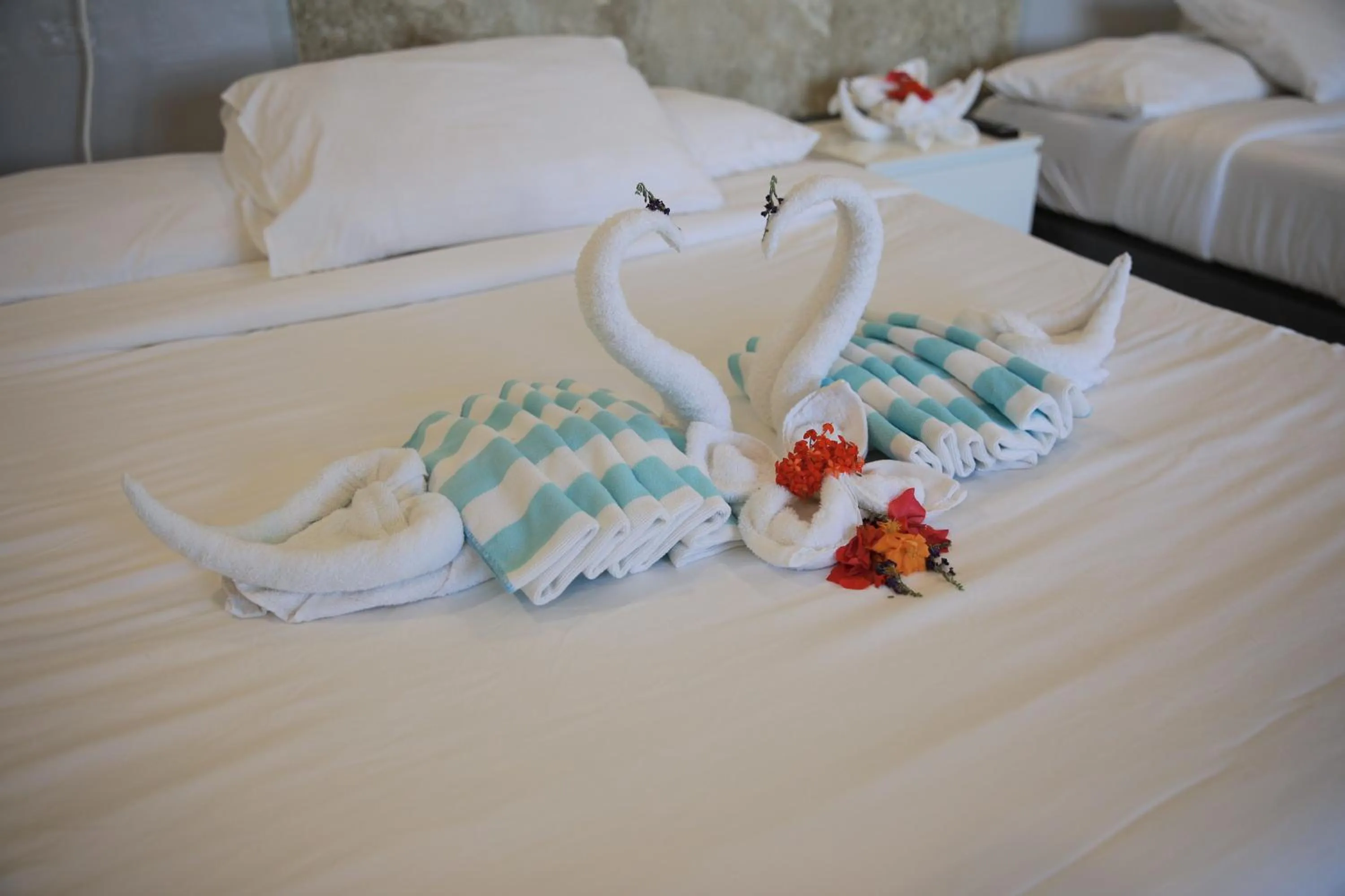 Bed in 버진 아일랜드 리조트 Virgin Island Resort Restaurant & Spa