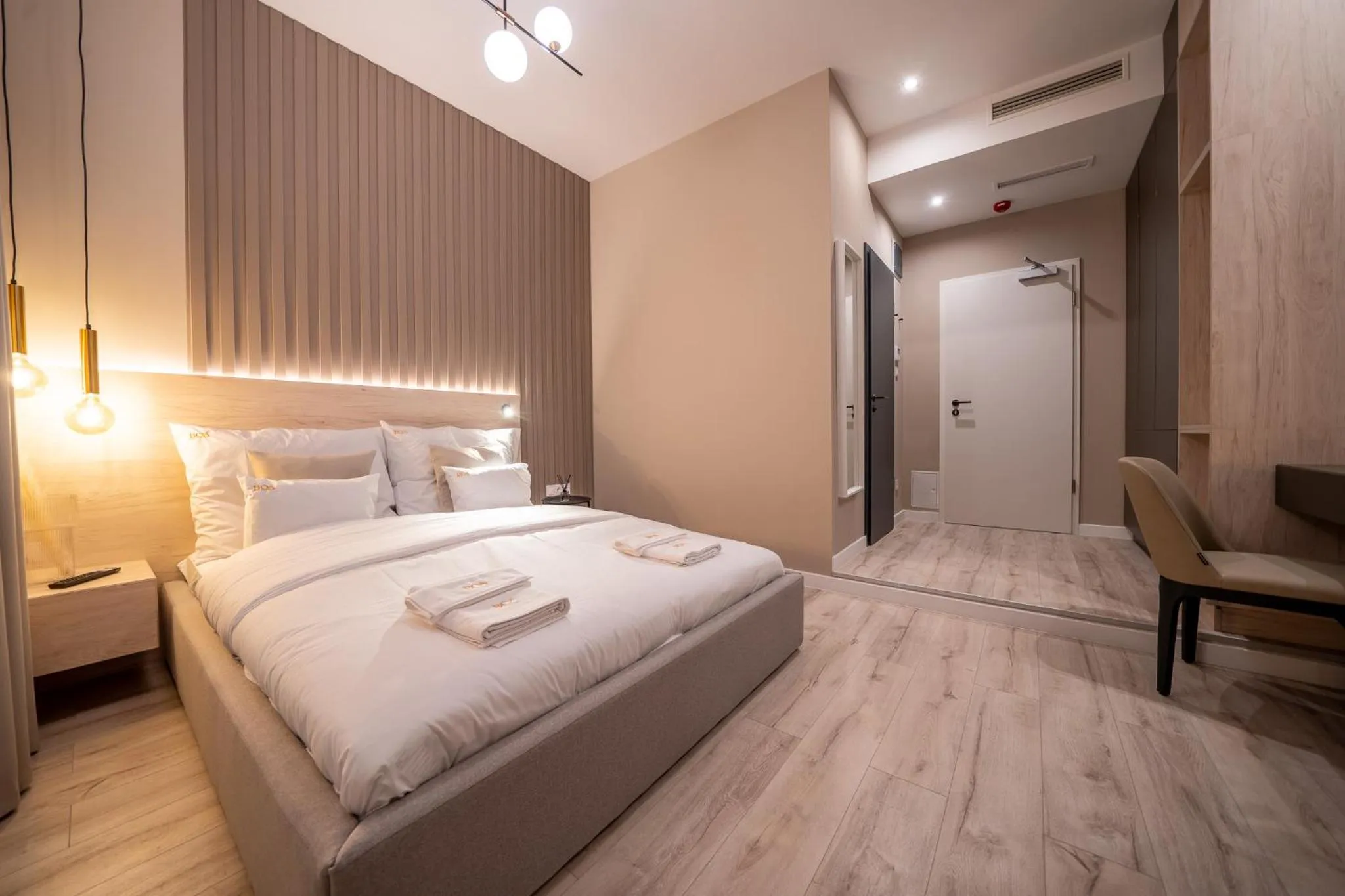 Bed in Karoly Boutique Suites, Best Location by BQA