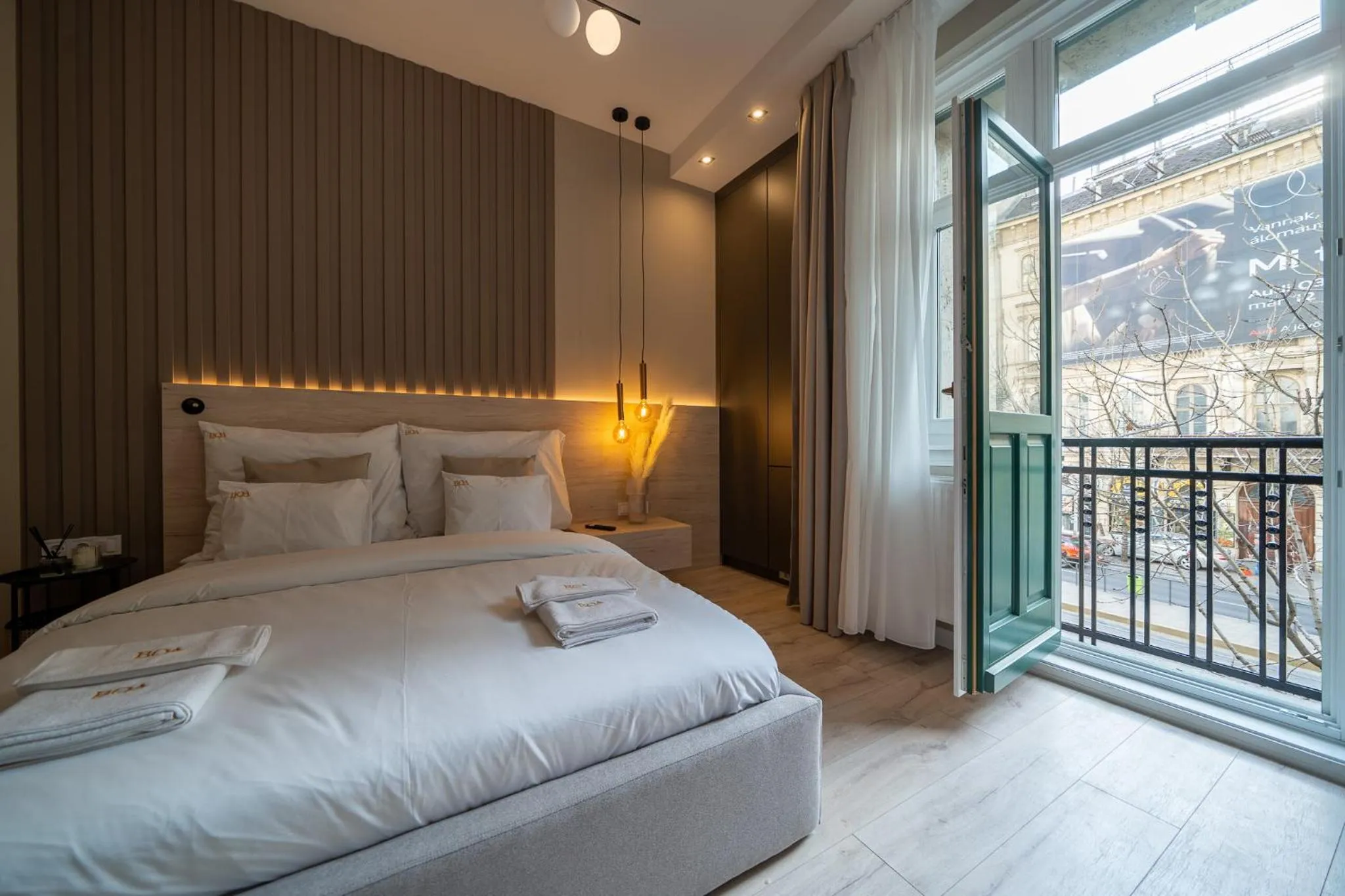 Bed in Karoly Boutique Suites, Best Location by BQA