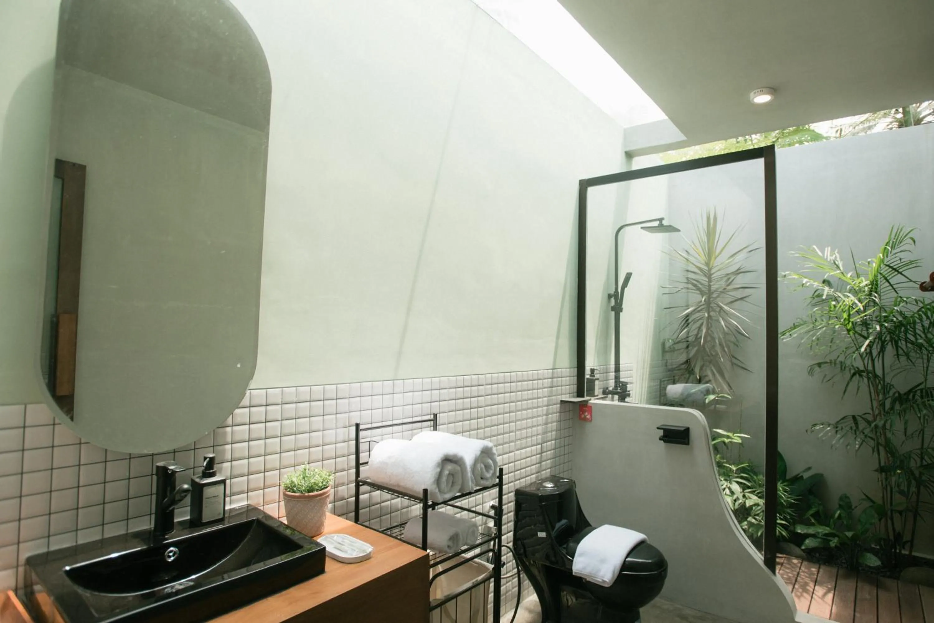 Bathroom in LAYANA FARMSTAY