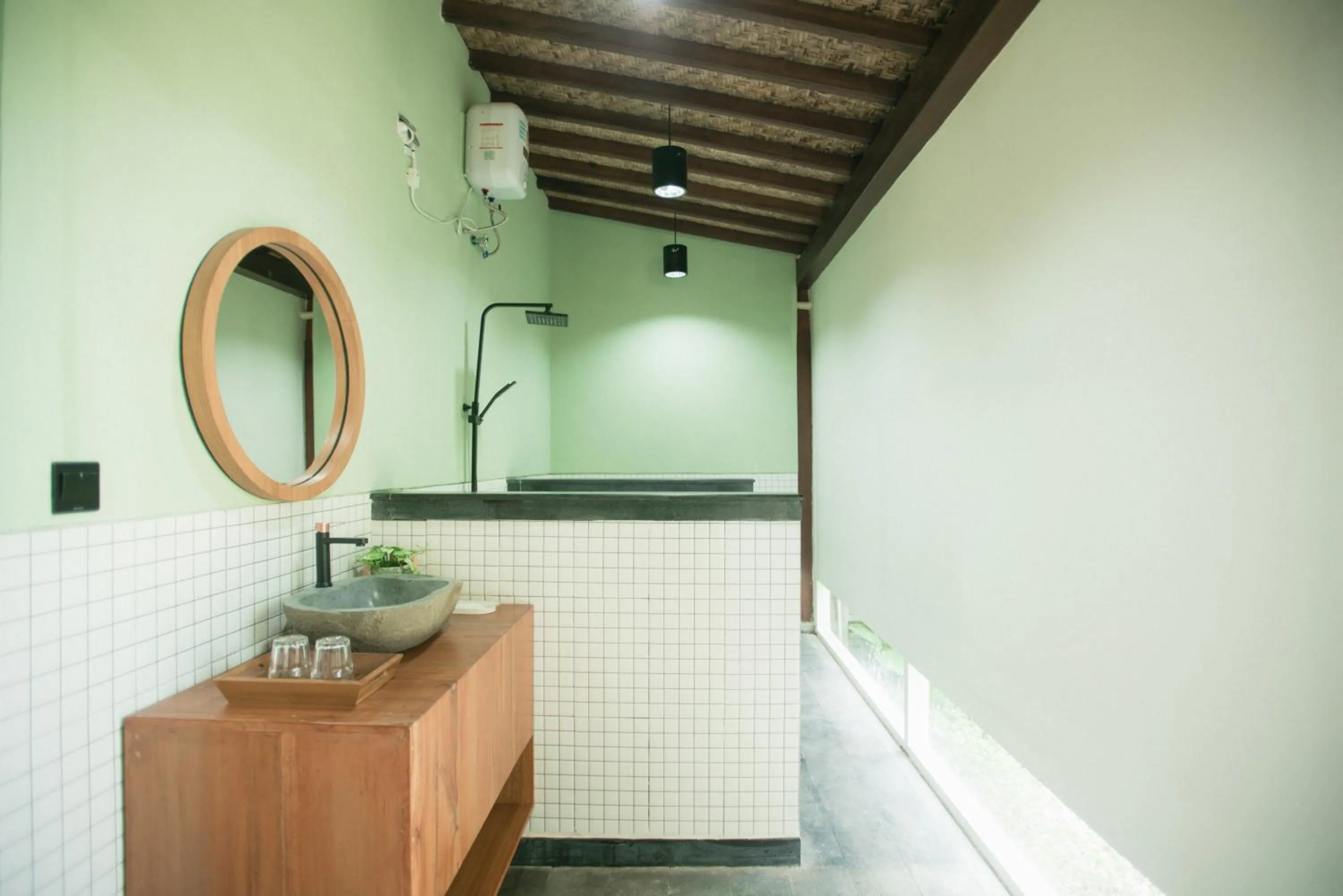 Bathroom in LAYANA FARMSTAY