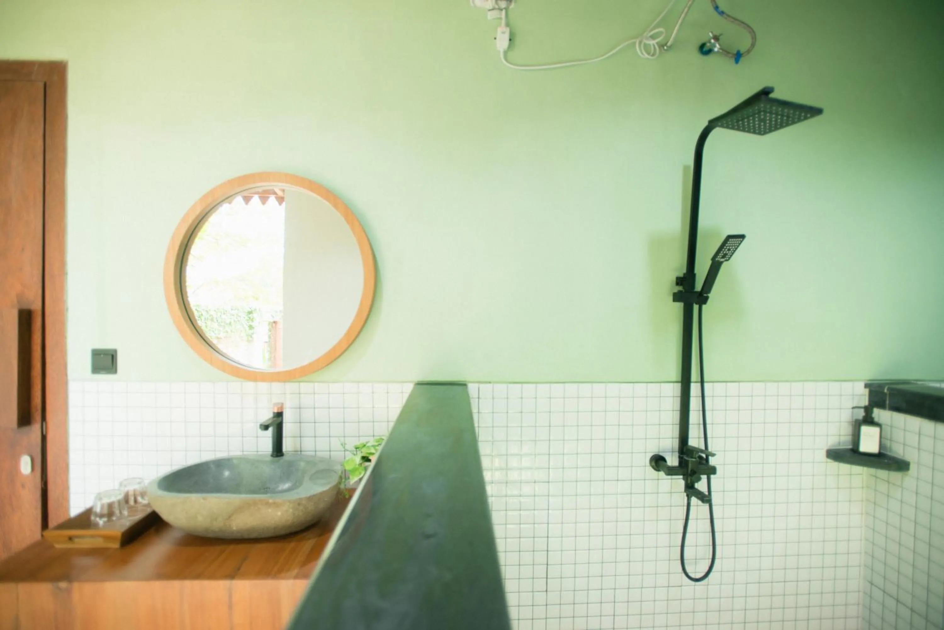 Bathroom in LAYANA FARMSTAY
