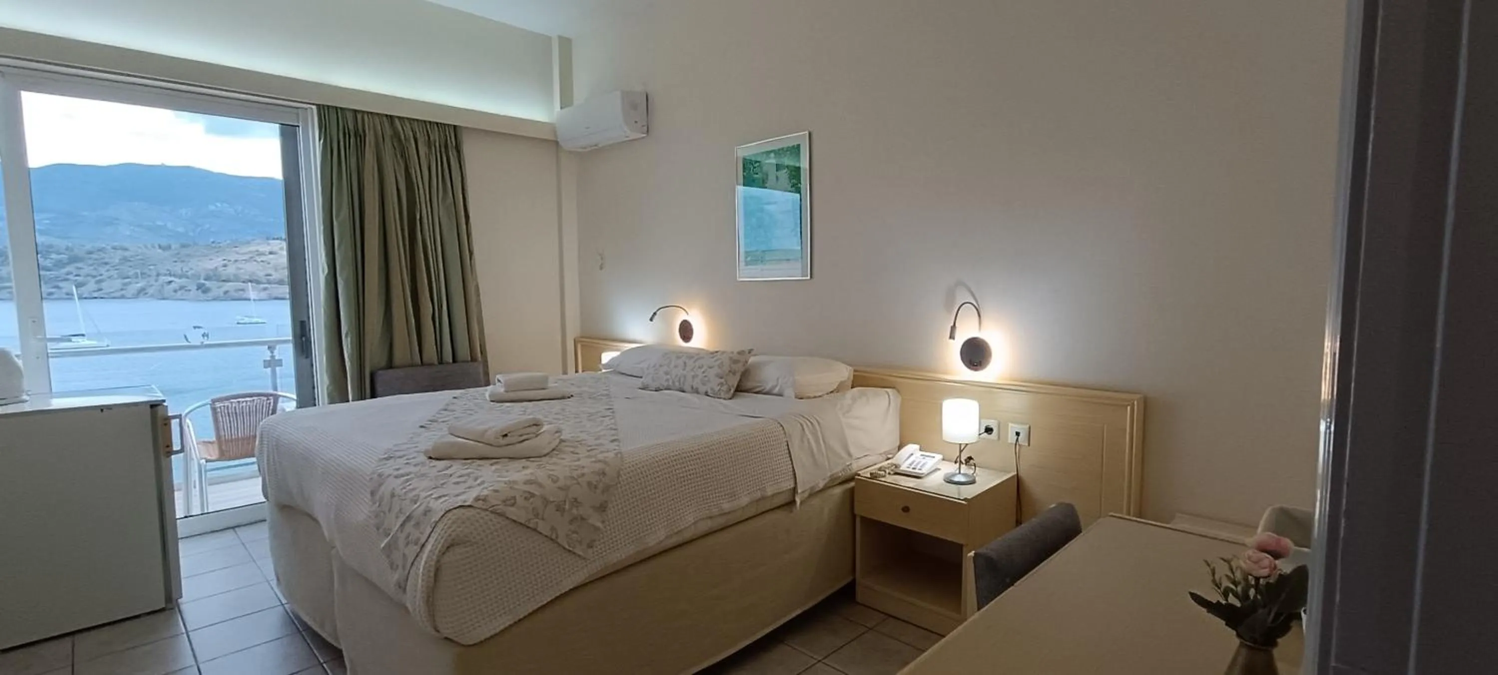 Bed in New Aegli Resort Hotel