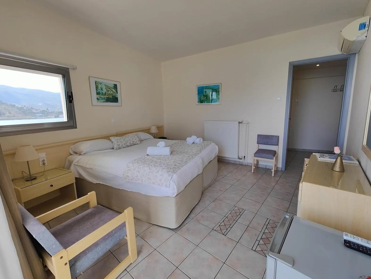 Bed in New Aegli Resort Hotel