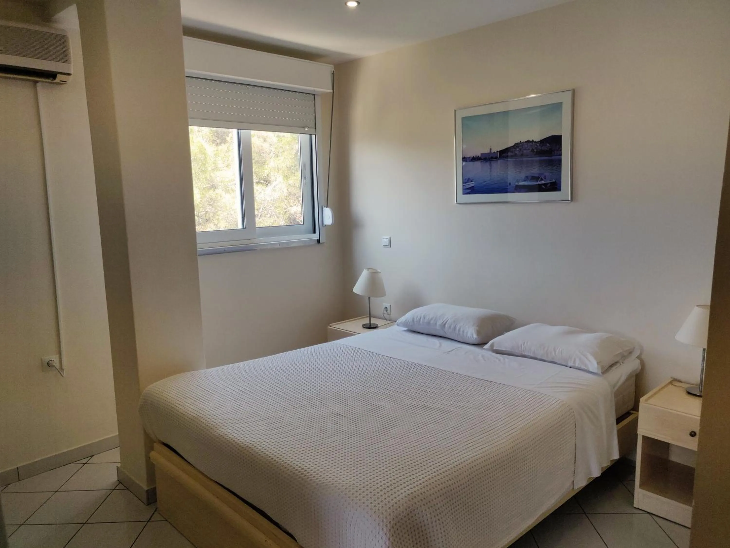 Photo of the whole room, Bed in New Aegli Resort Hotel