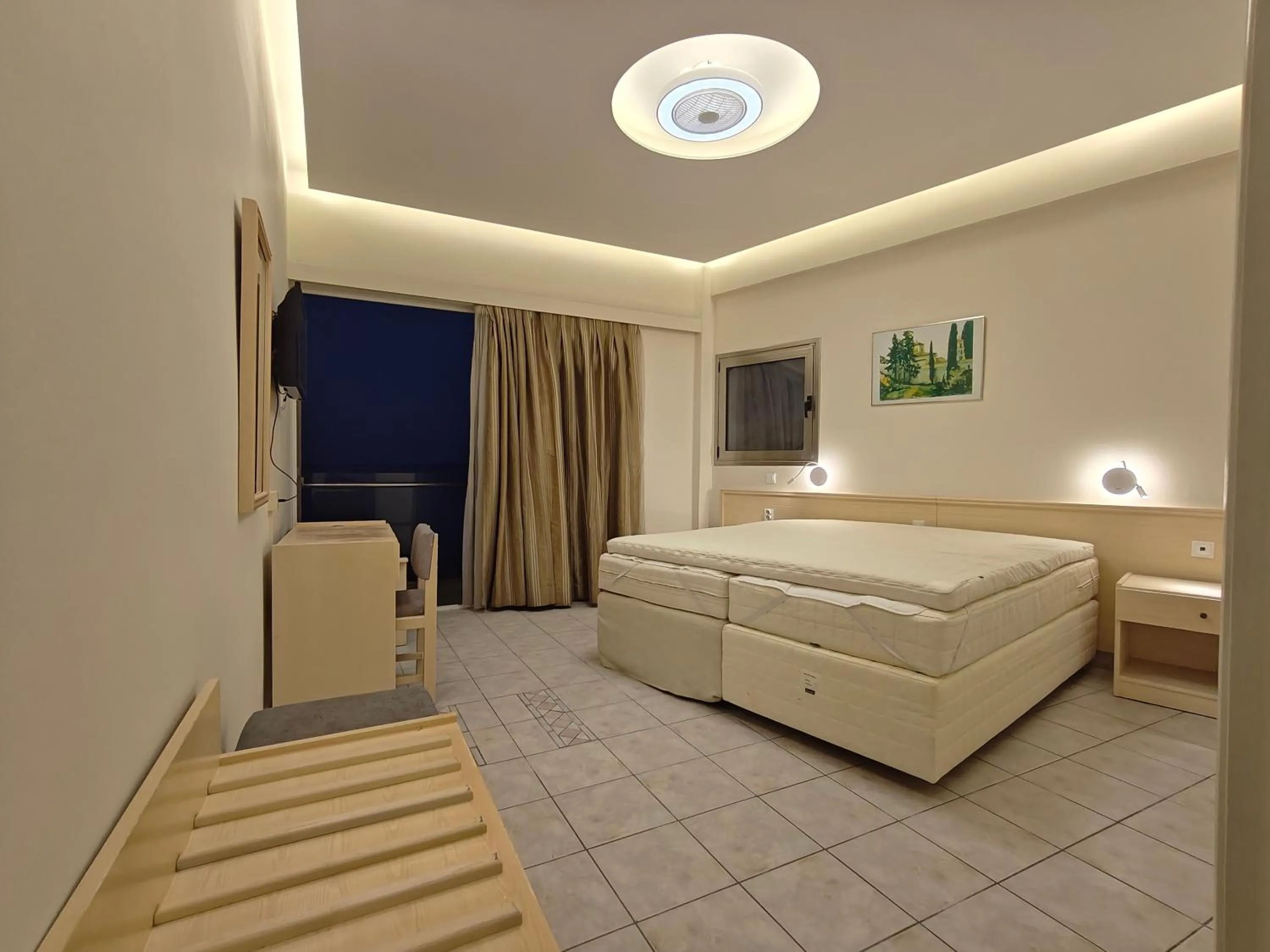 Bed in New Aegli Resort Hotel