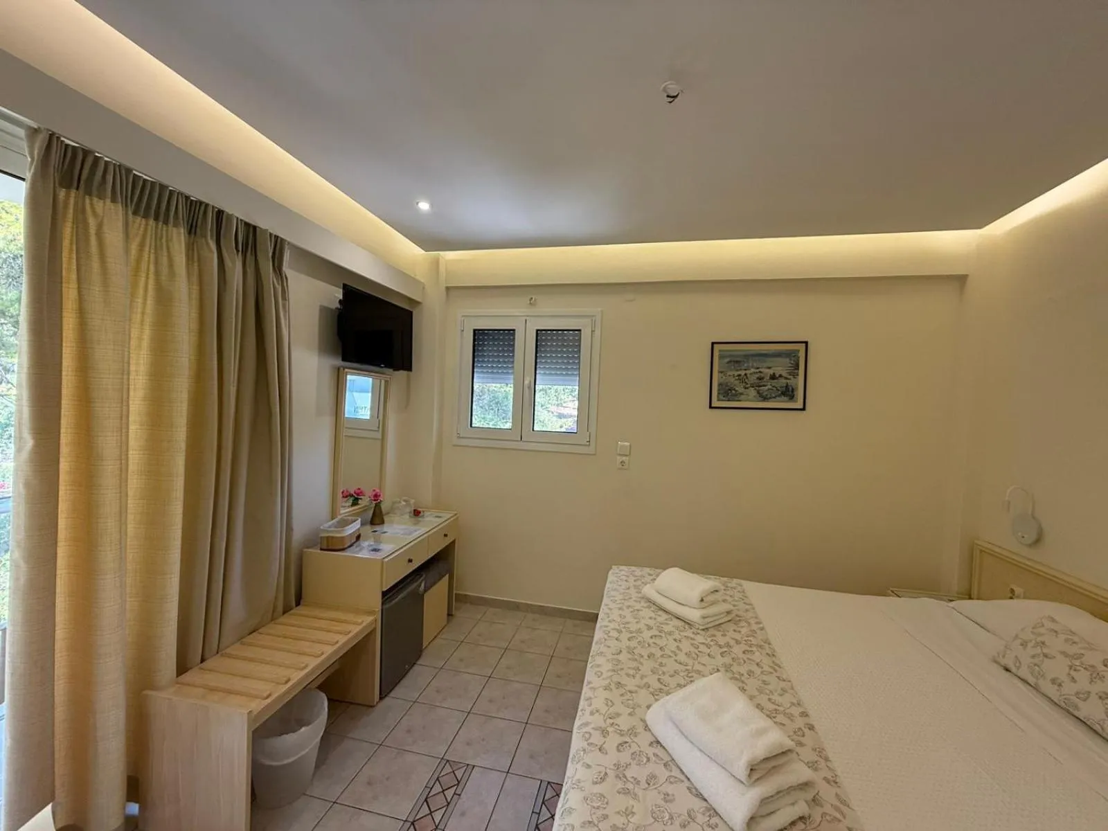 Bed in New Aegli Resort Hotel