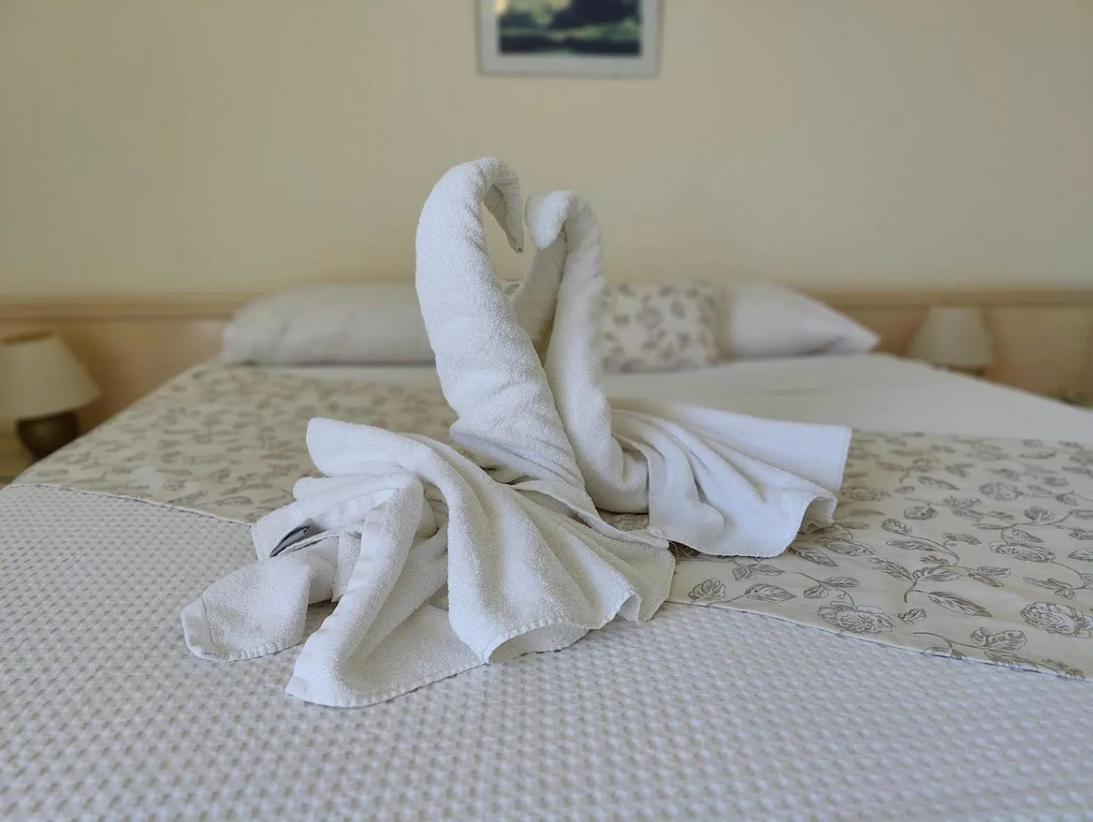 Bed in New Aegli Resort Hotel