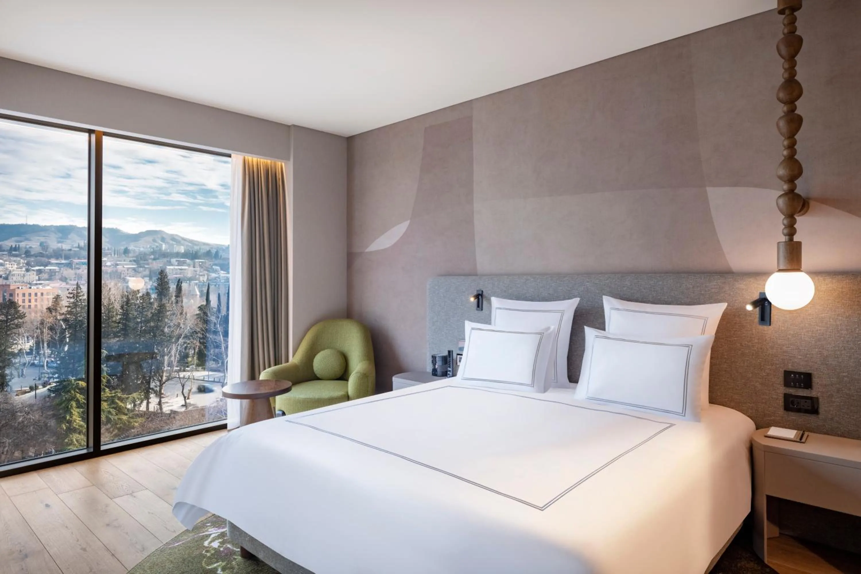 Bed in Swissôtel Tbilisi