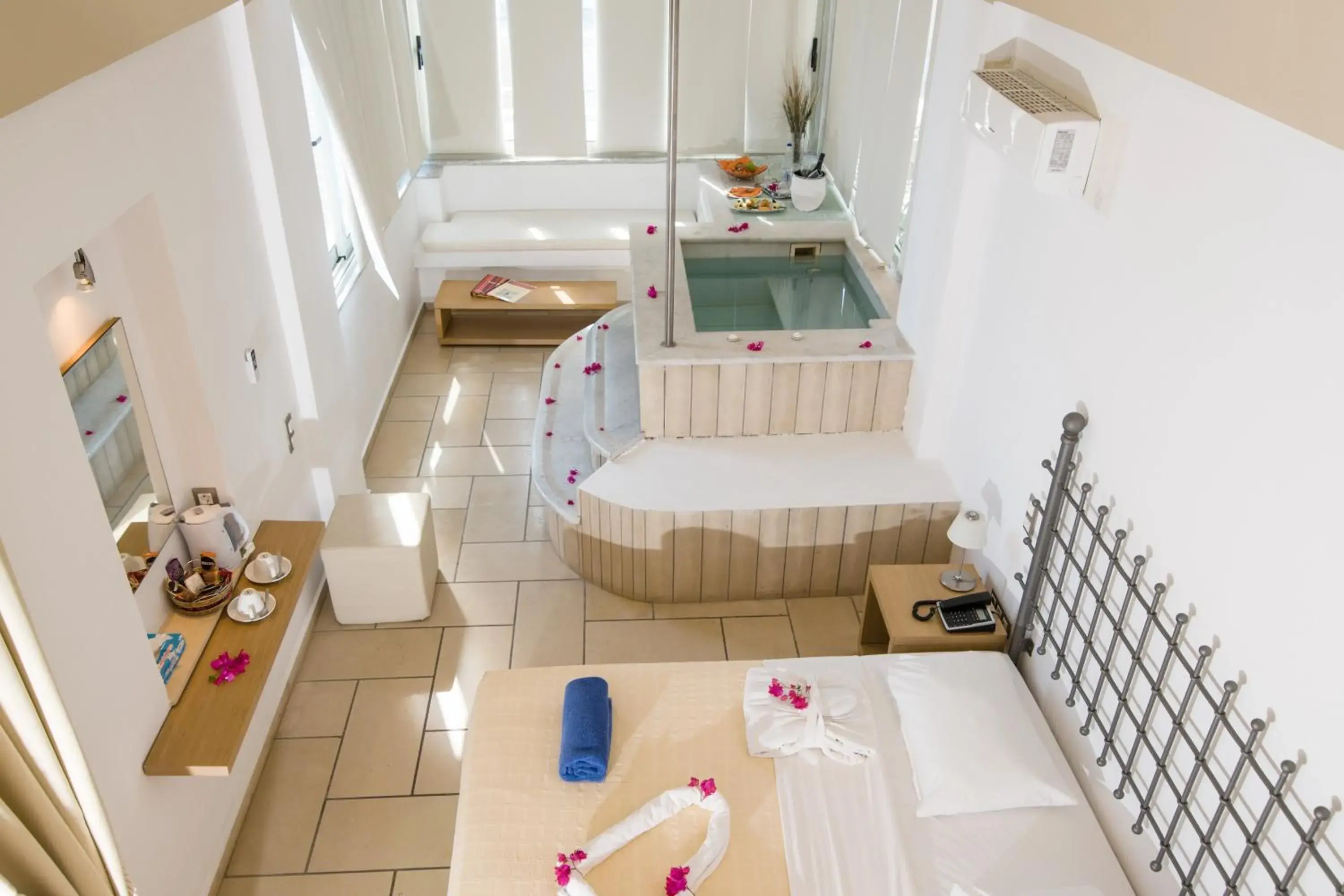 Photo of the whole room, Bed in Antinea Suites Hotel & Spa Photo of the whole room, Bed in Antinea Suites Hotel & Spa