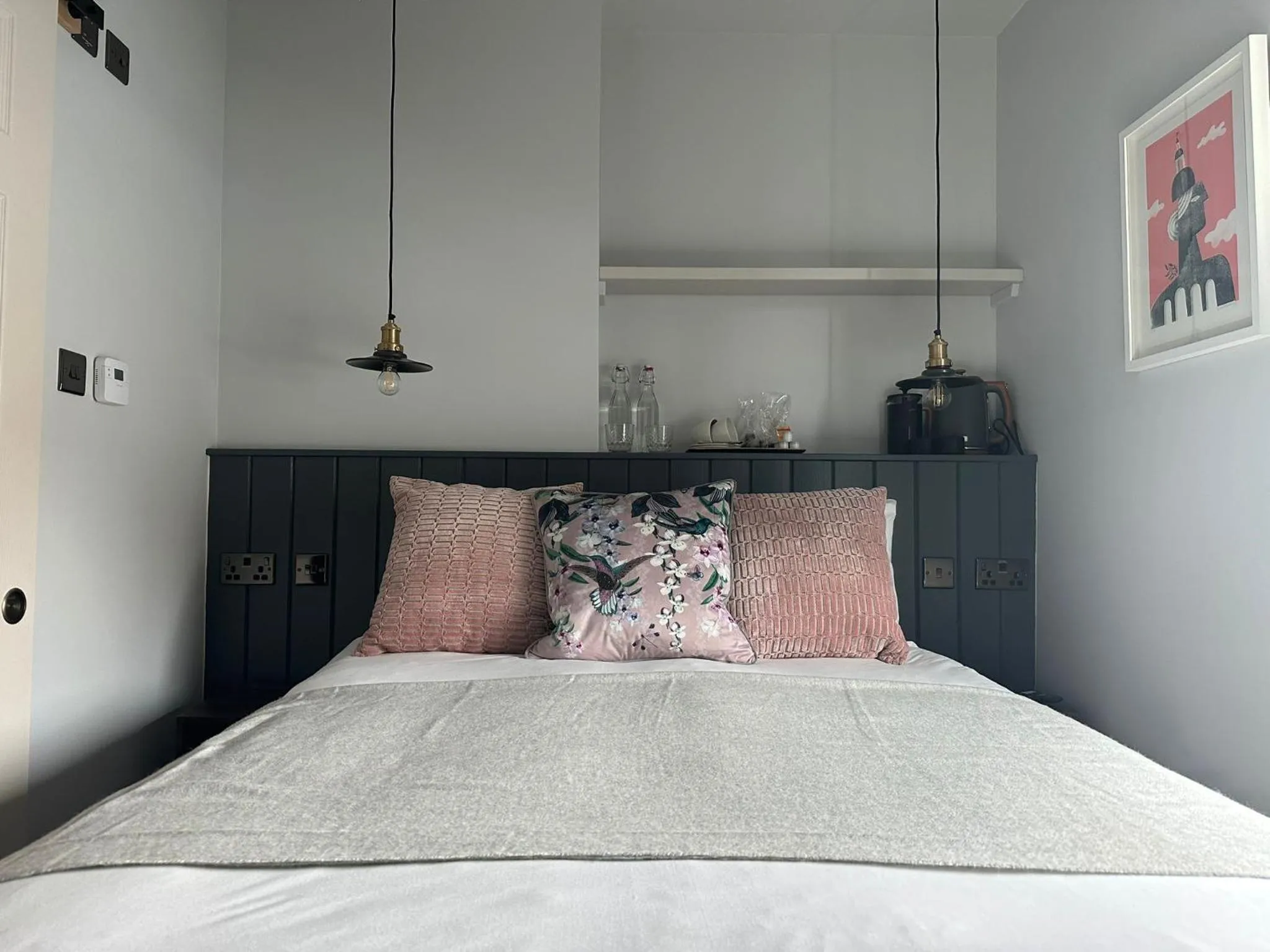 Bed in Rooms Above Sugar Boat