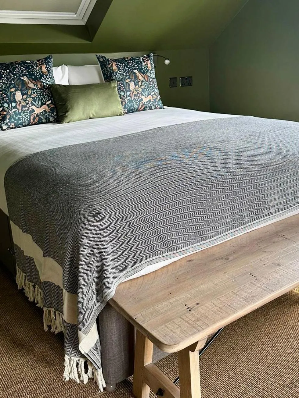 Bed in Rooms Above Sugar Boat