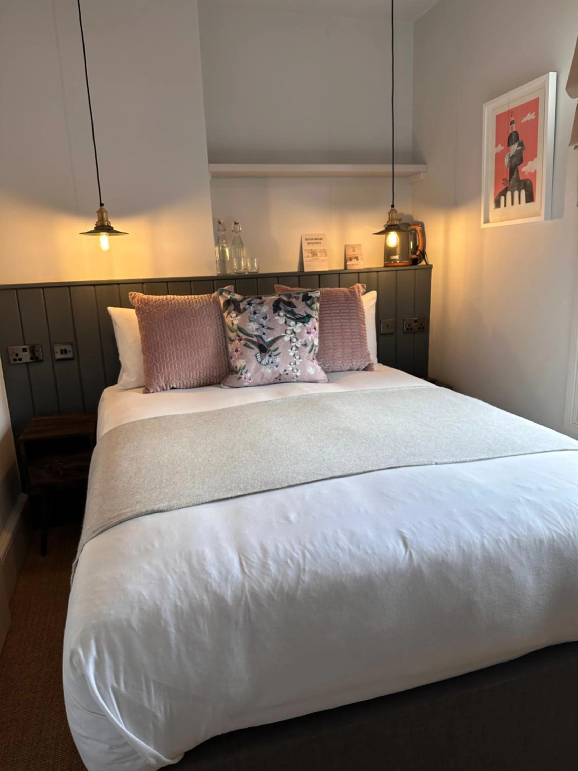 Bed in Rooms Above Sugar Boat