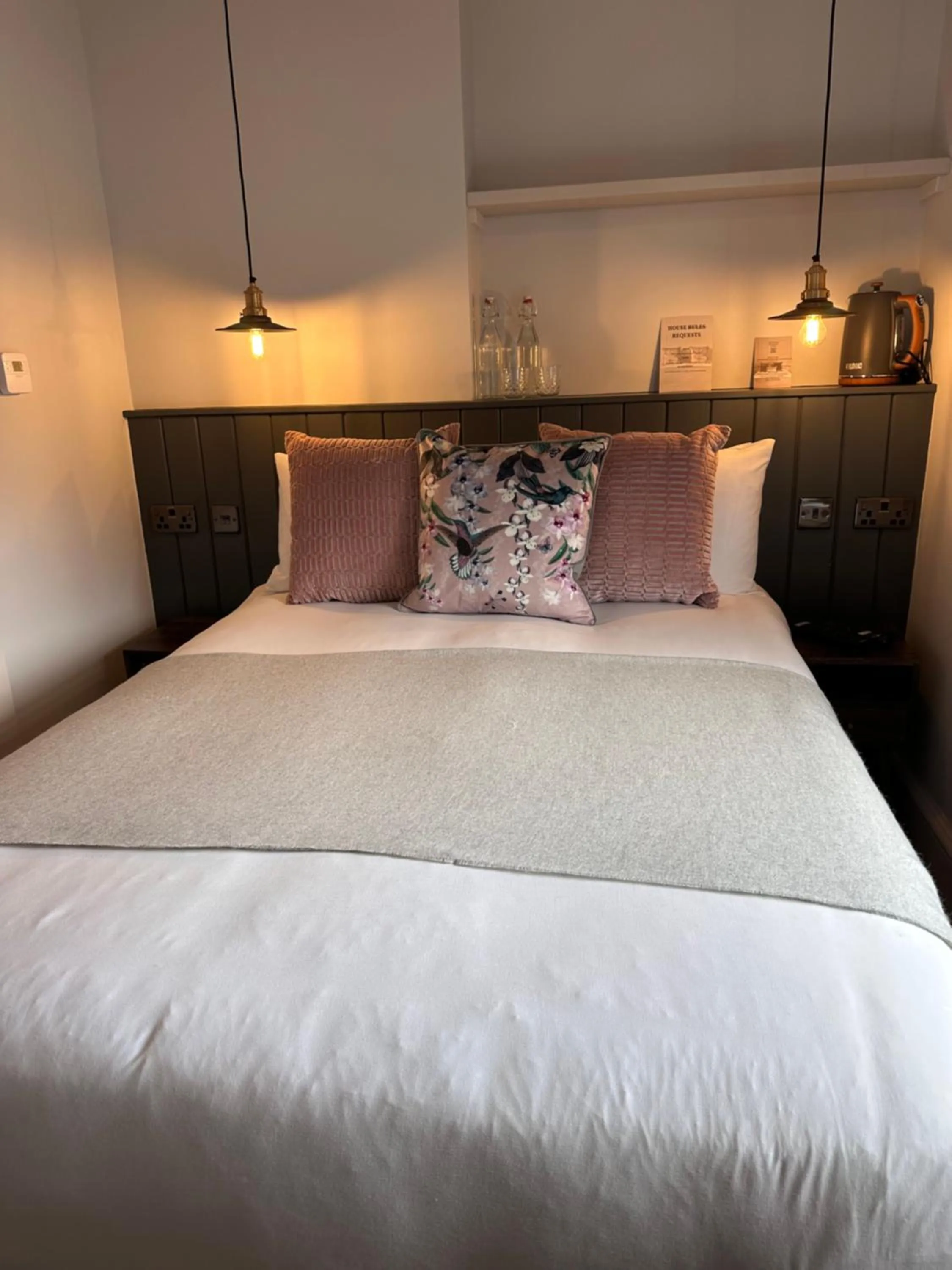 Bed in Rooms Above Sugar Boat