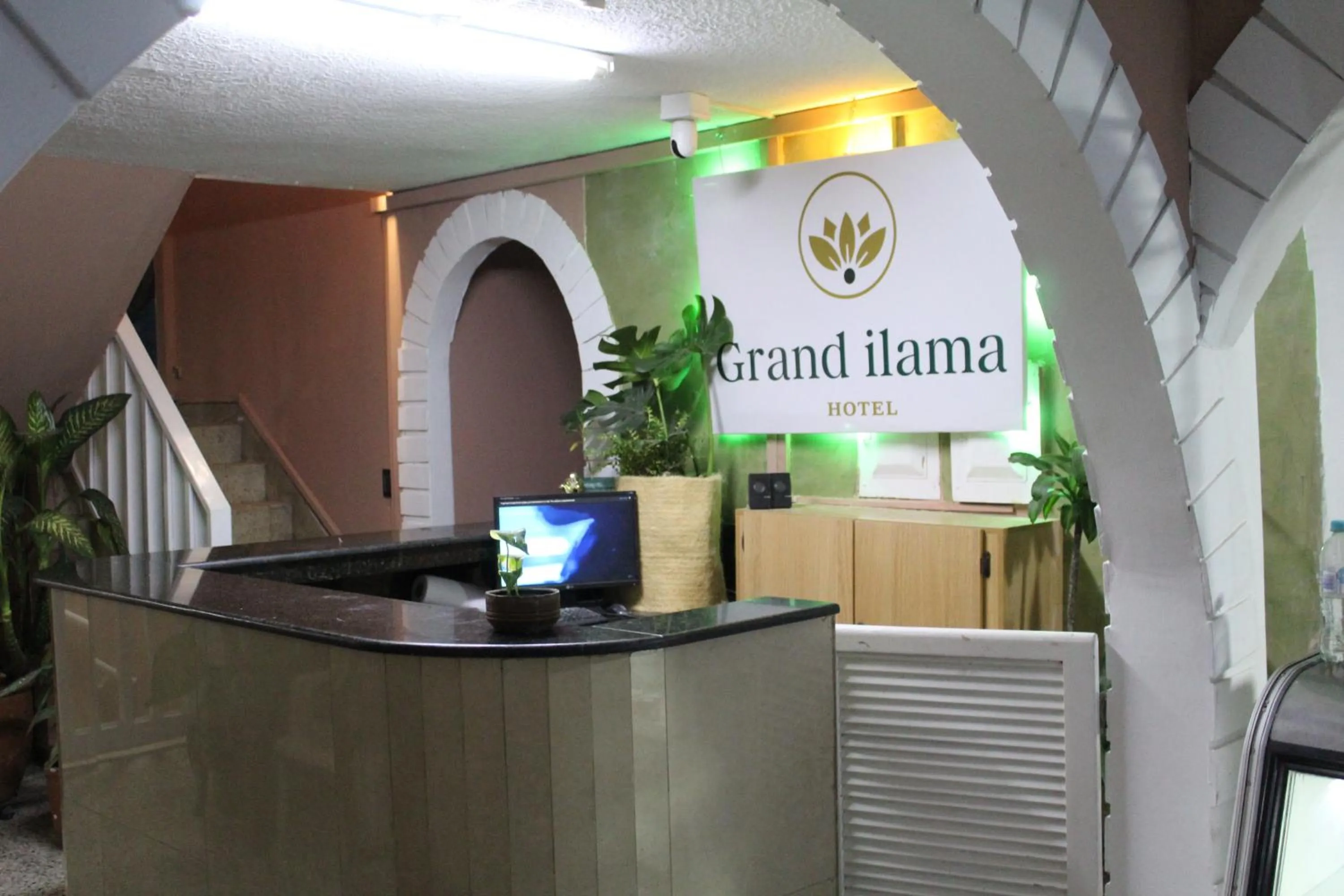 Property logo or sign in Hotel Grand ilama