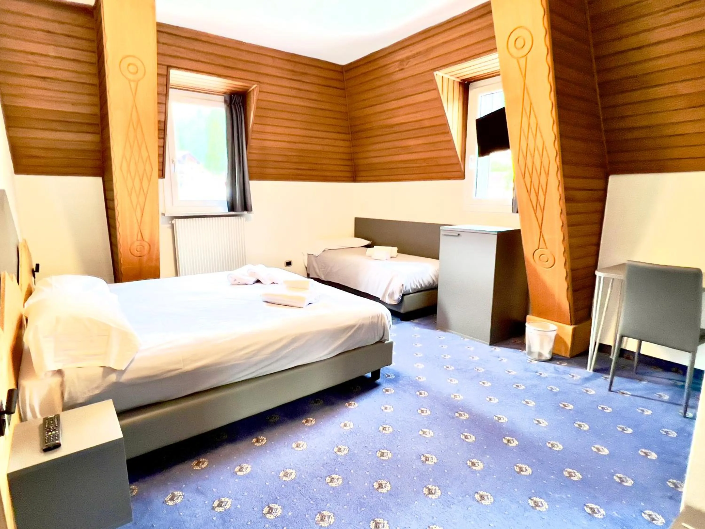 Bed in Hotel Regina del Bosco