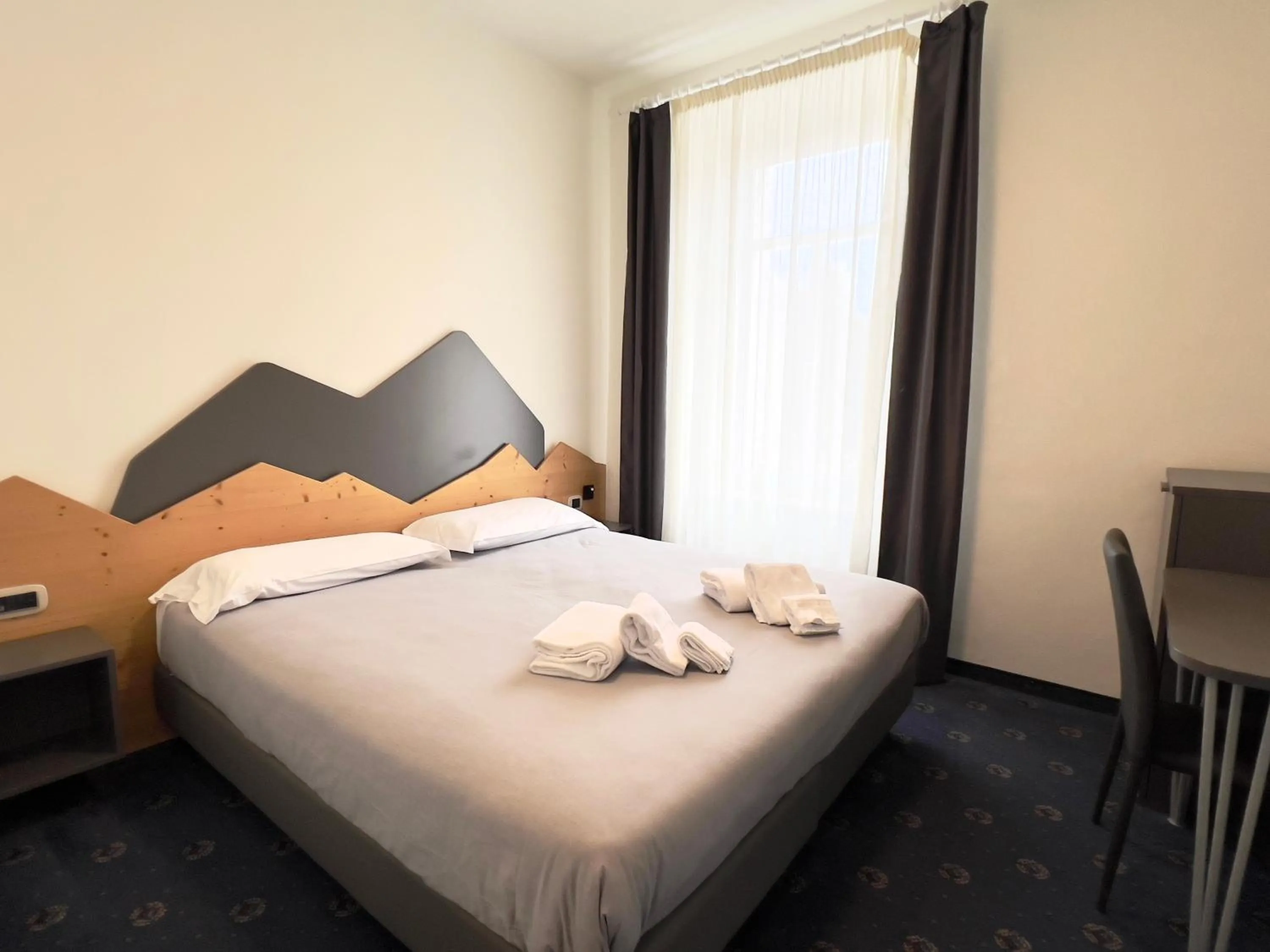 Photo of the whole room, Bed in Hotel Regina del Bosco