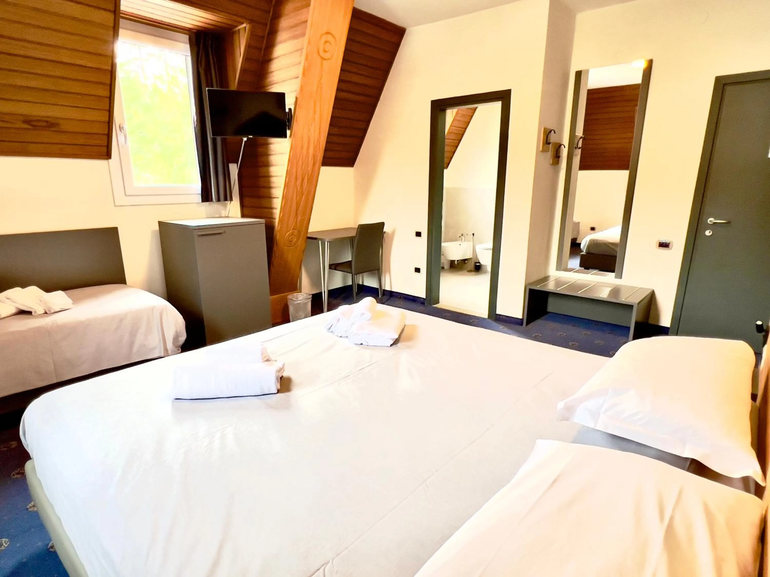 Bed in Hotel Regina del Bosco