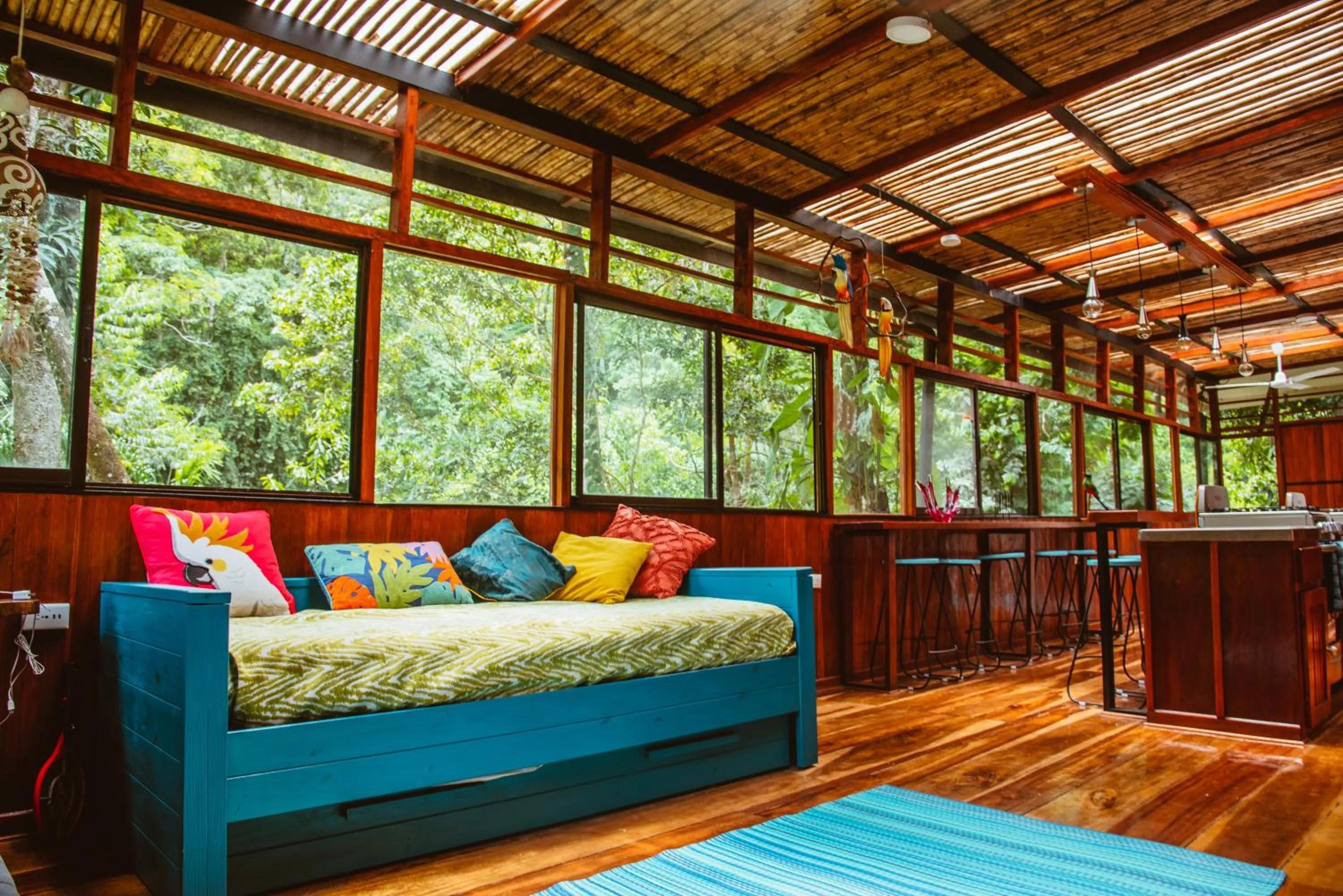 Communal lounge/ TV room, Bed in Selva Madre Eco-Sanctuary