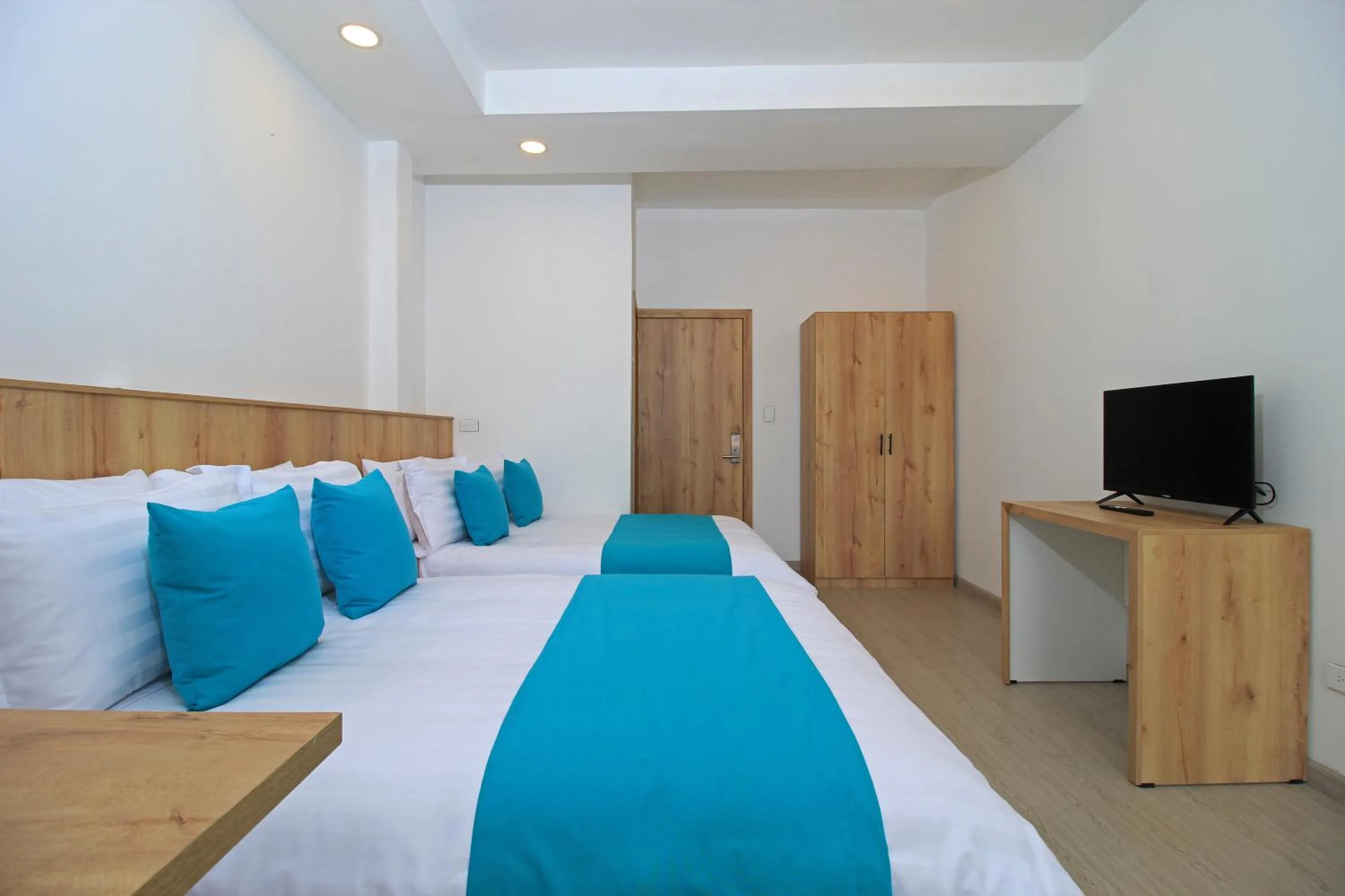 Bed in Apart Hotel Casa Blanca