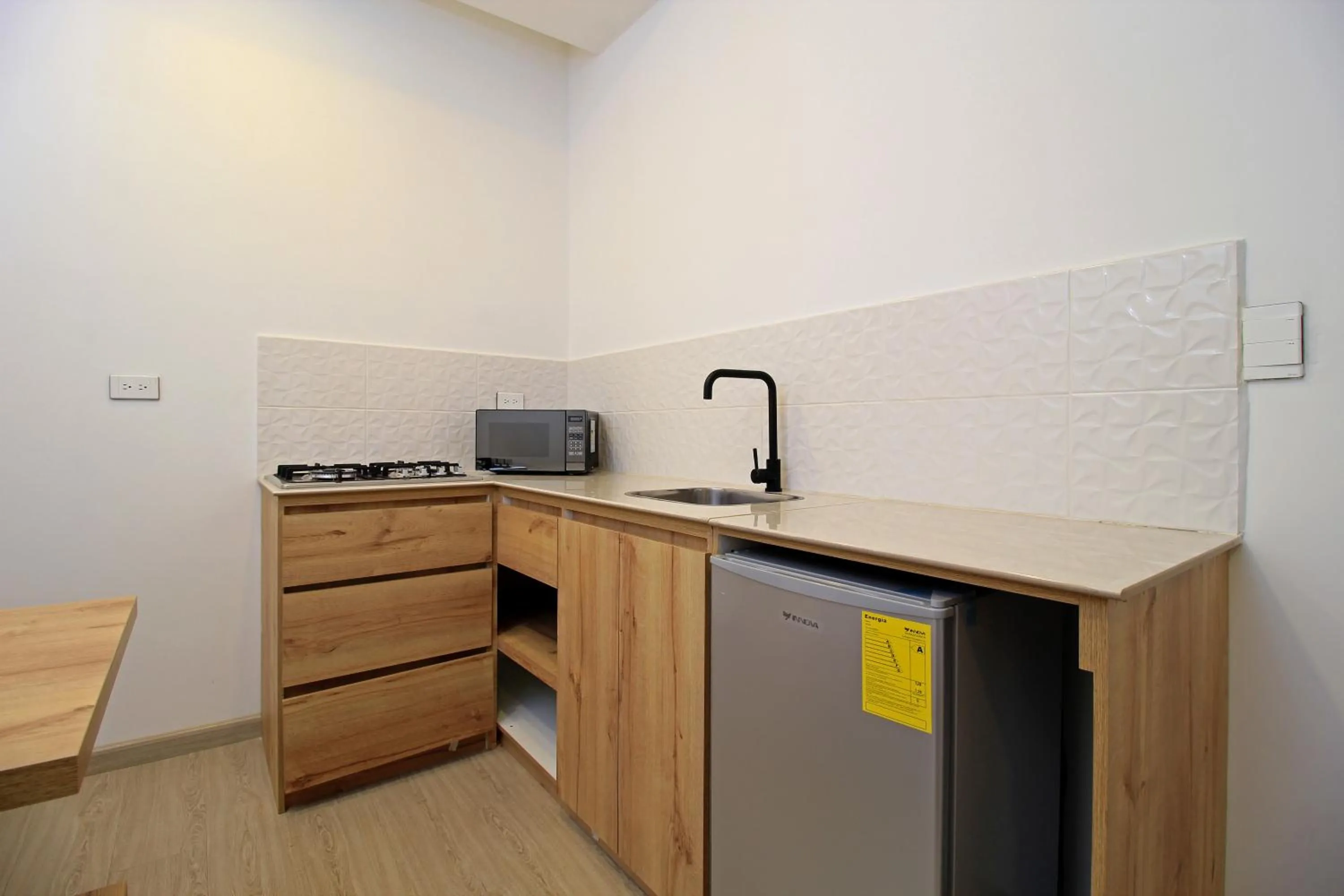 Kitchen or kitchenette in Apart Hotel Casa Blanca