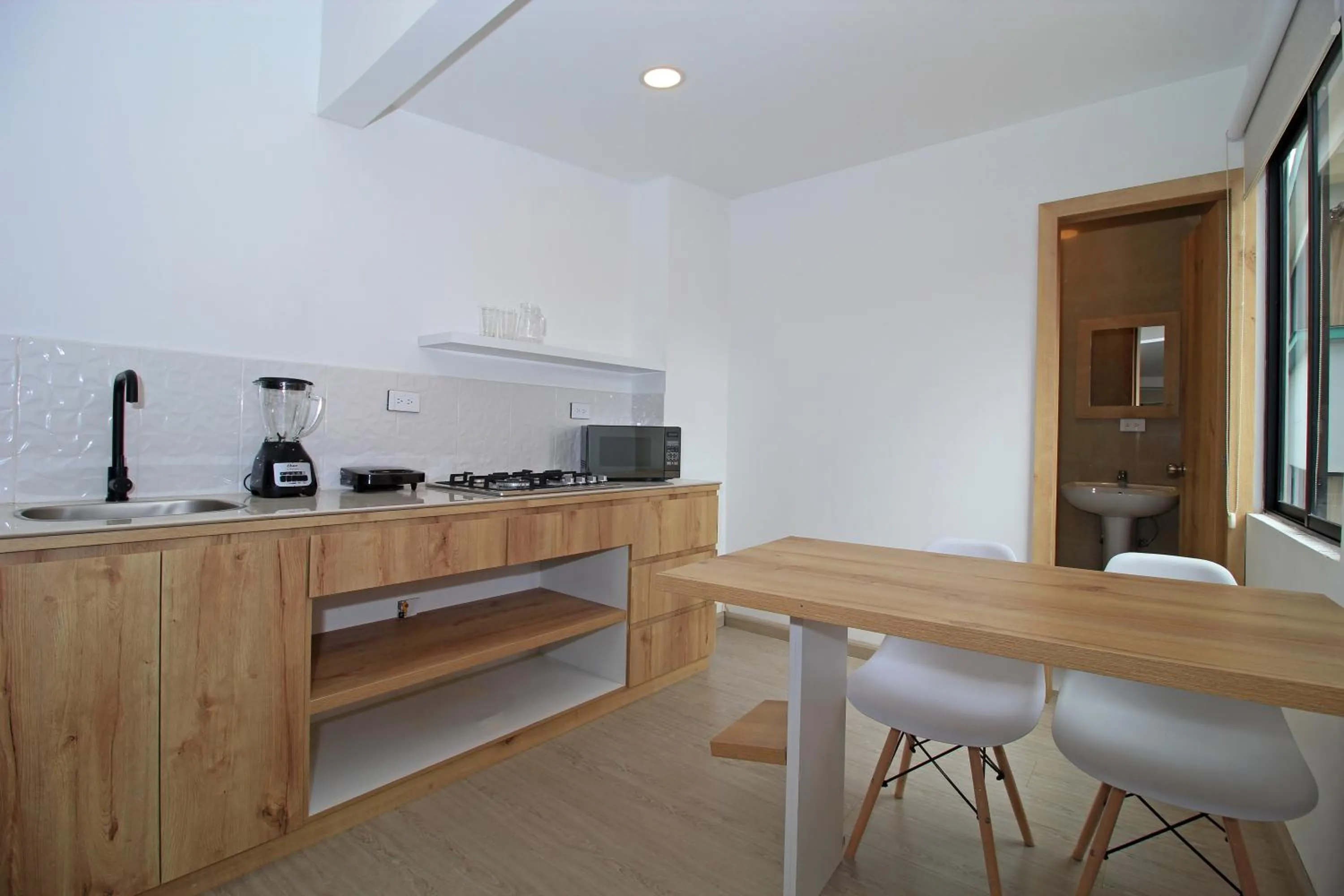 Kitchen or kitchenette in Apart Hotel Casa Blanca