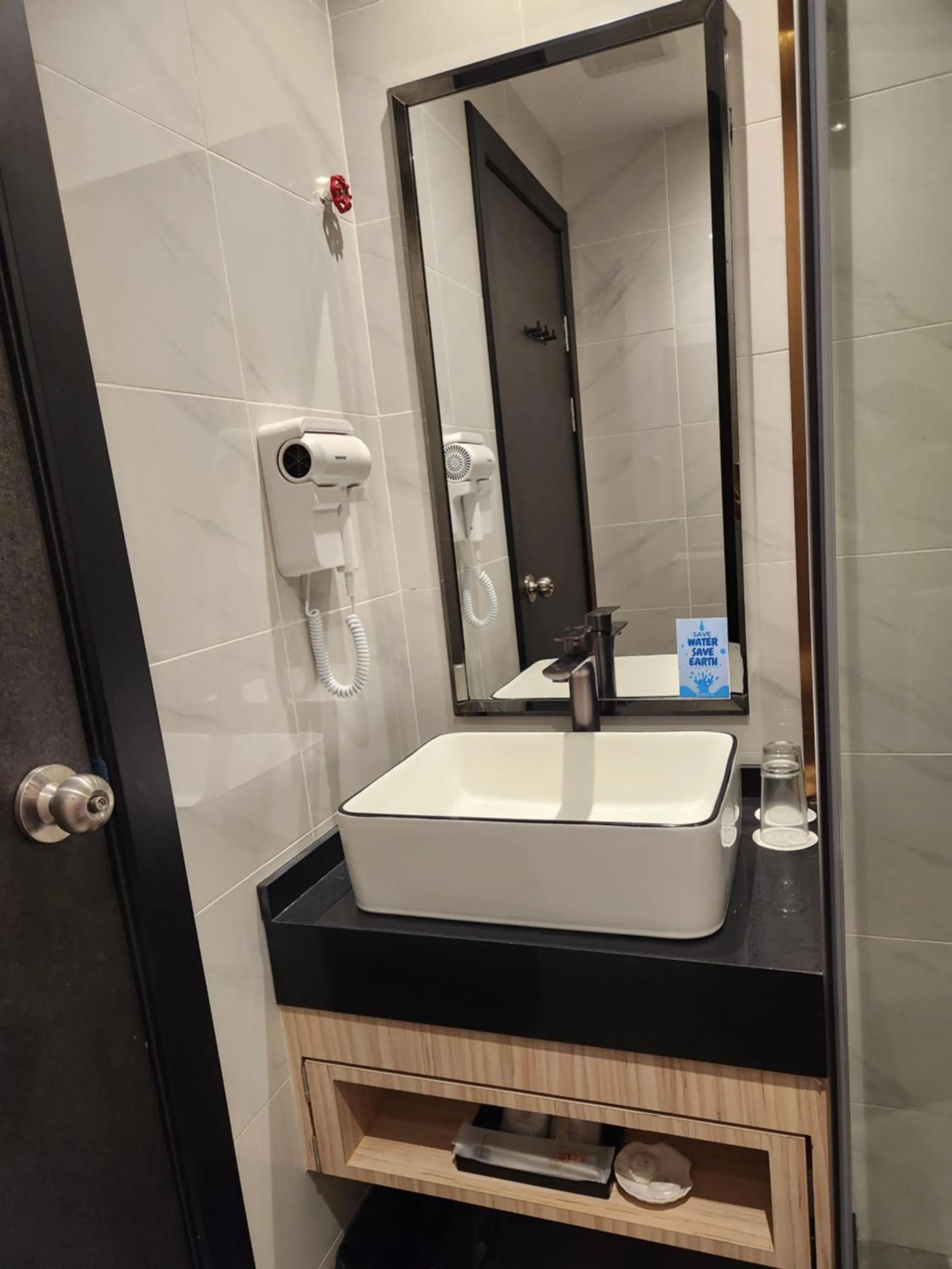 Bathroom in Hotel Marudu Inn